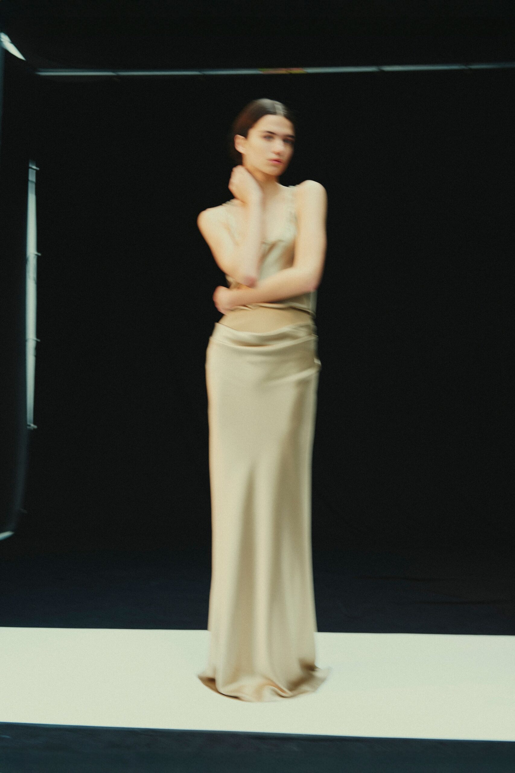 beige silk sleeveless gown