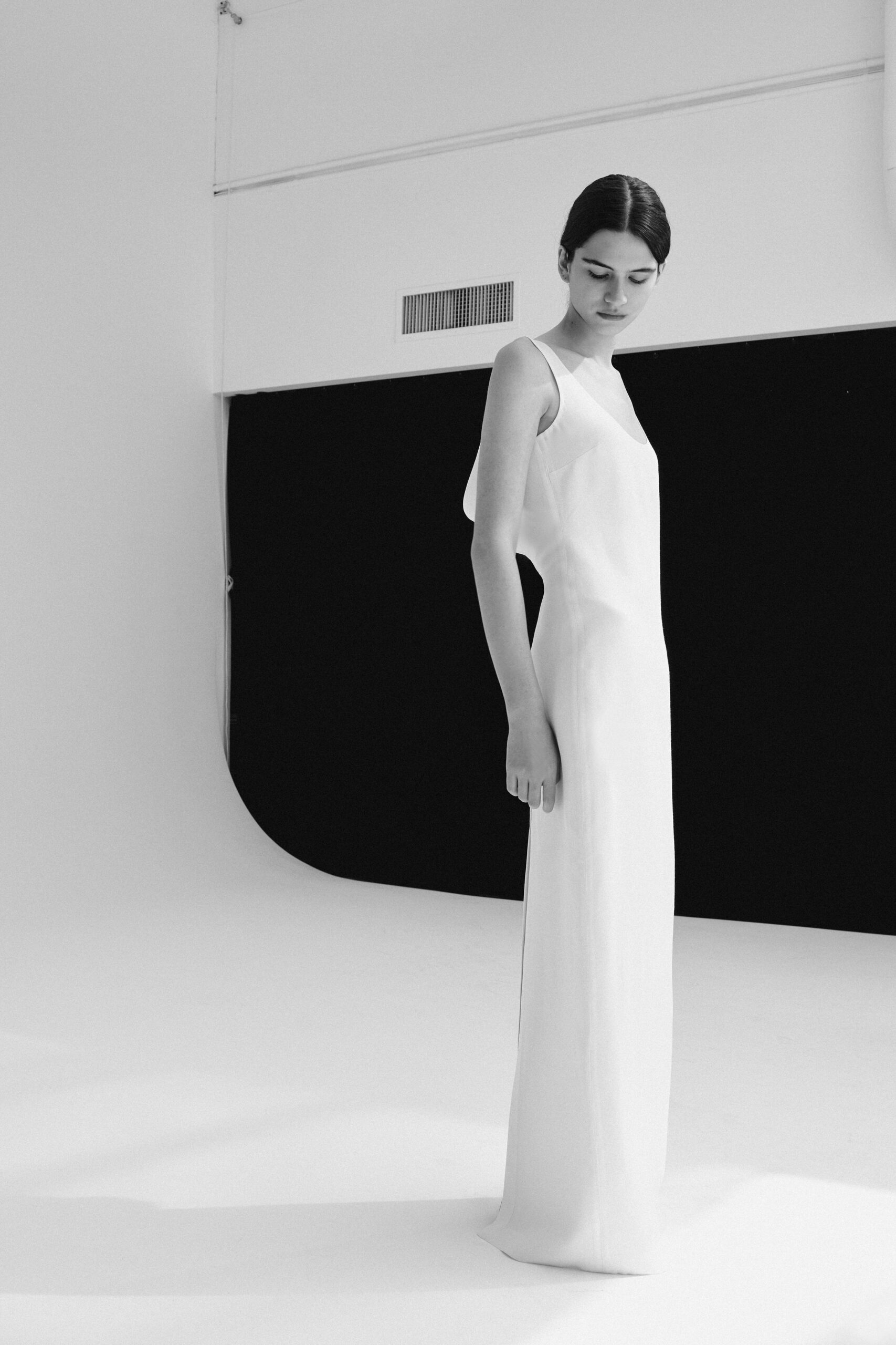 white silk sleeveless gown