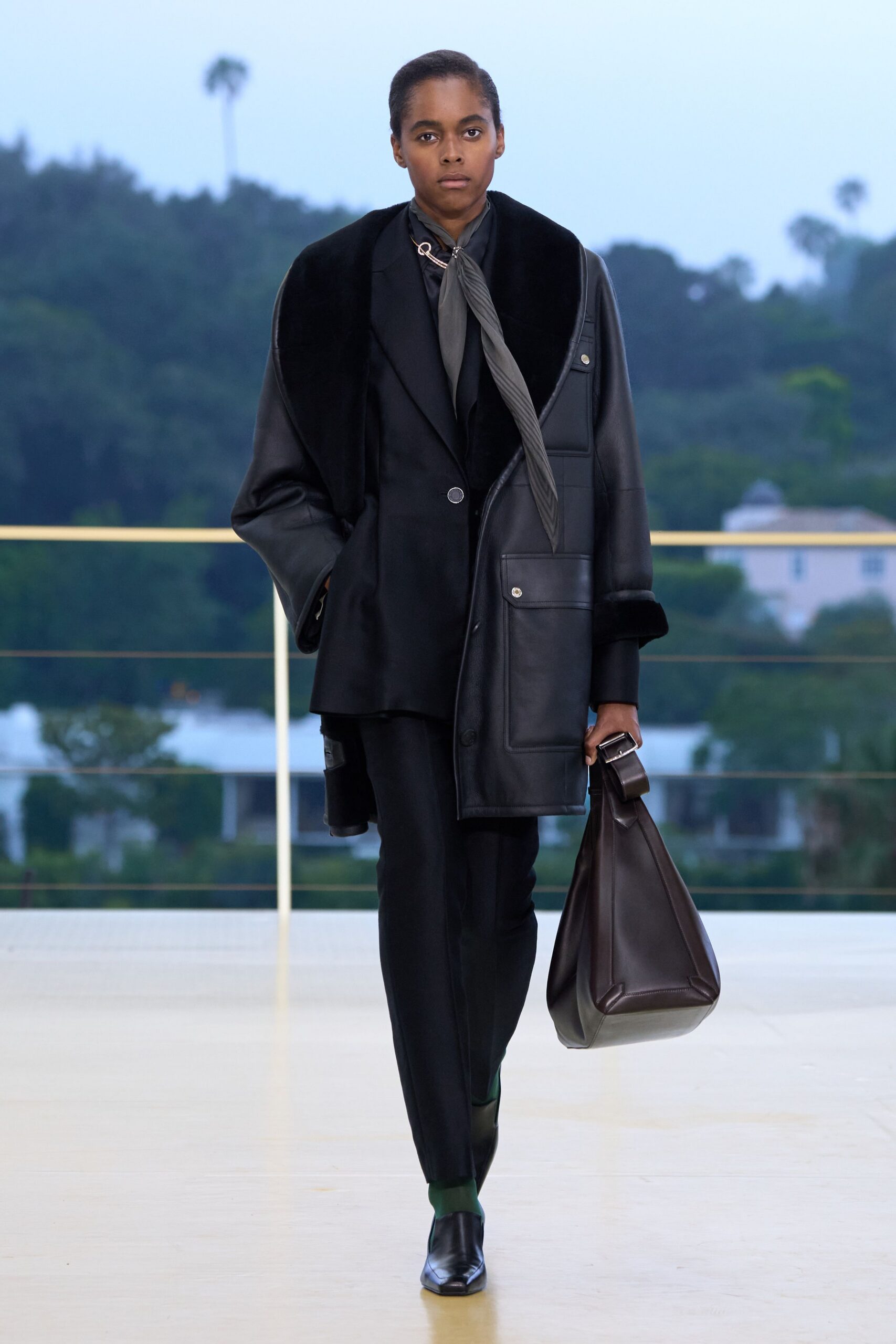 black leather long-sleeve collared fitted buttoned coat