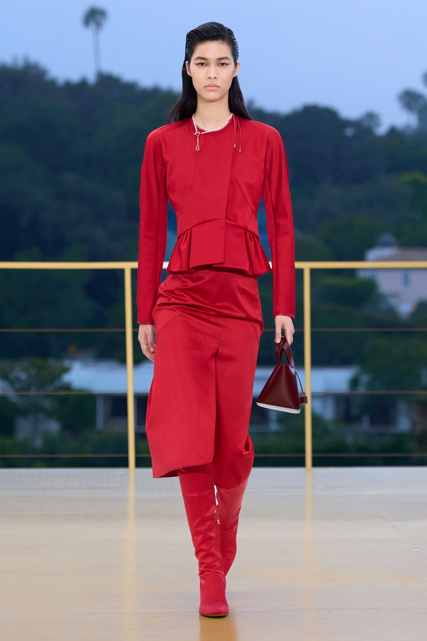 red long-sleeve collared fitted top