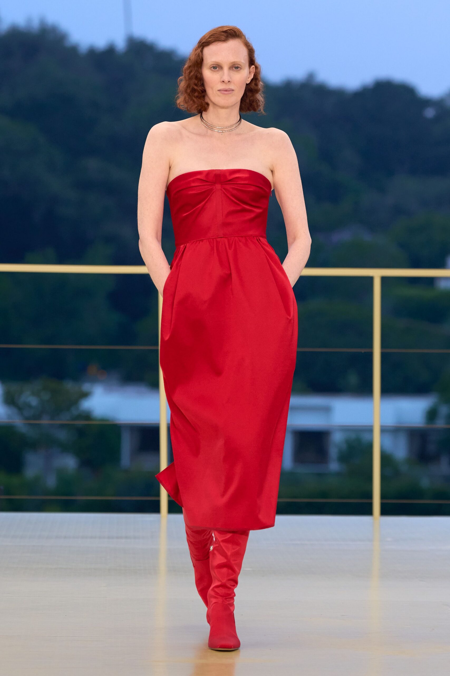 red silk strapless fitted pockets midi gown