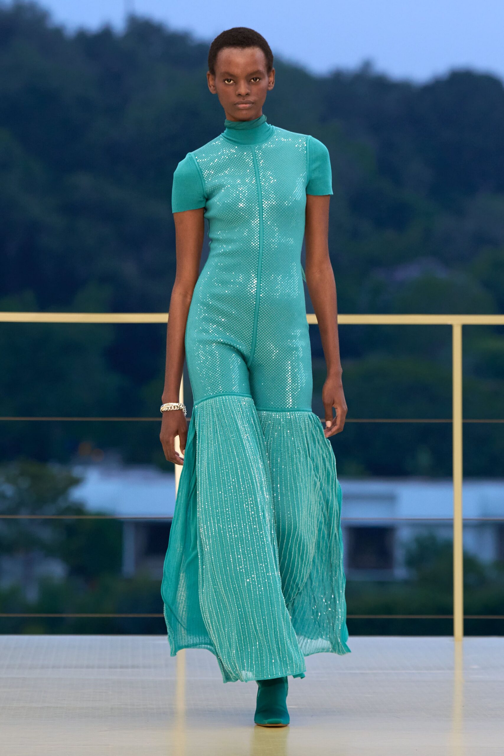 teal sequined flared jumpsuit