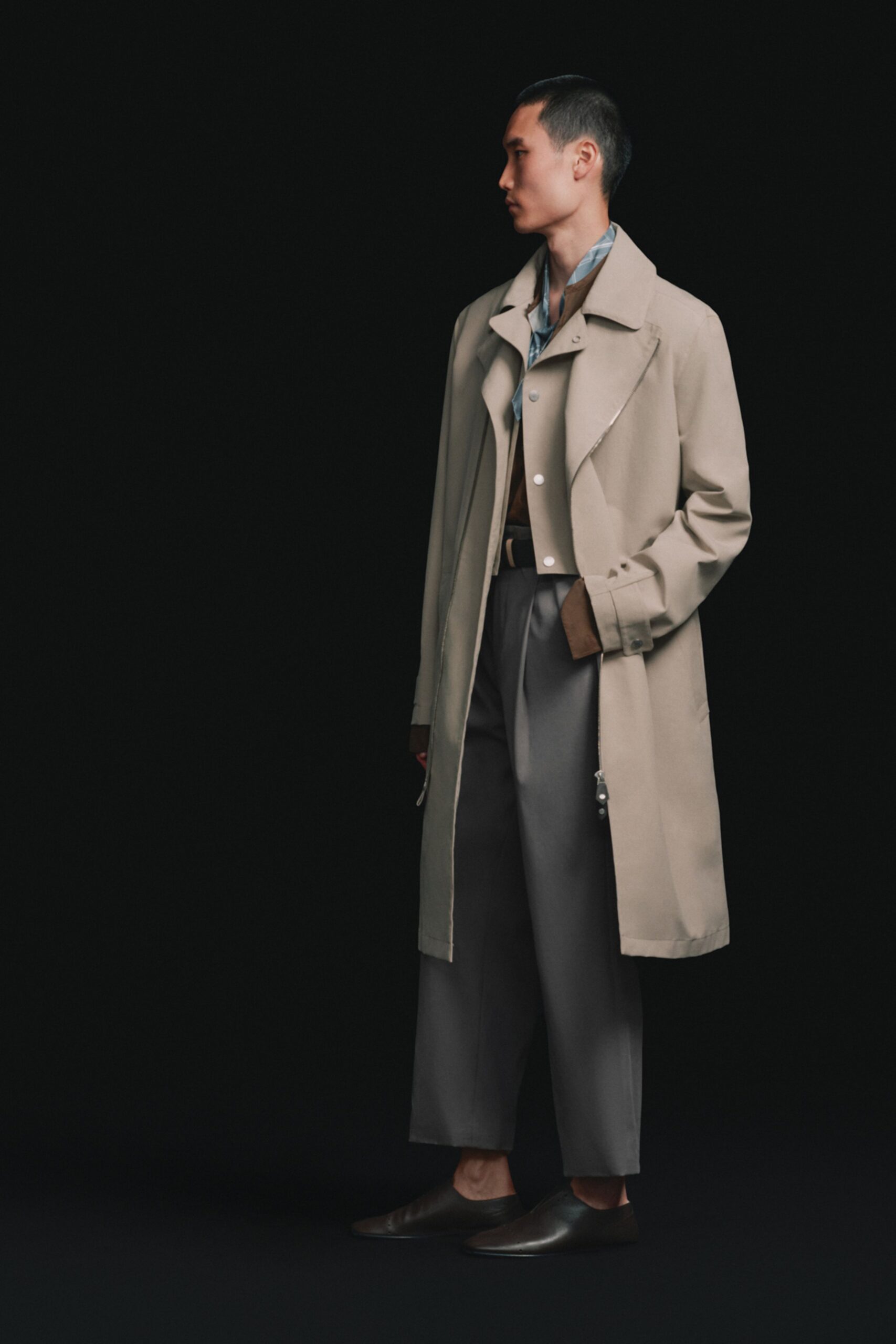 beige trench coat with blue shirt