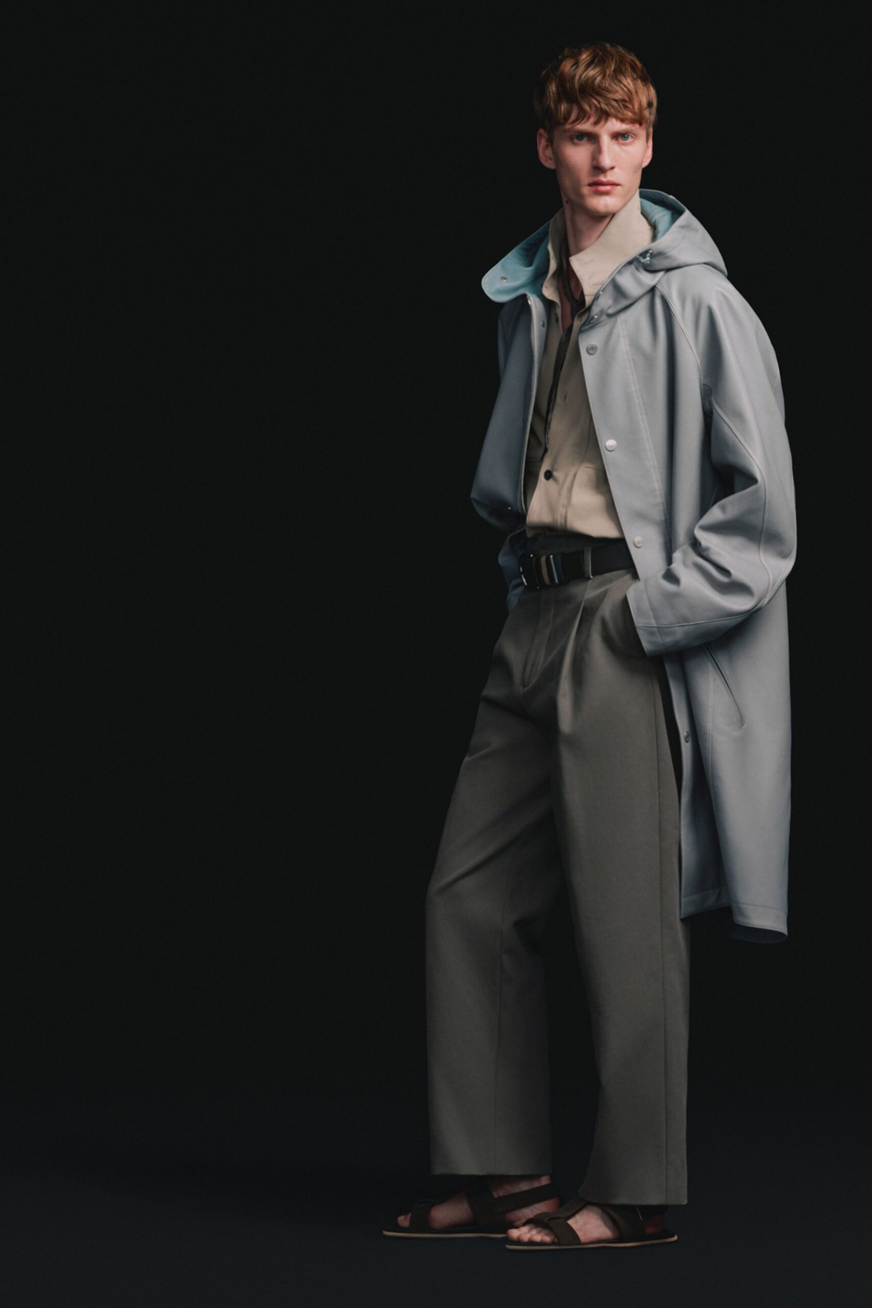 blue vinyl long-sleeve collared relaxed coat