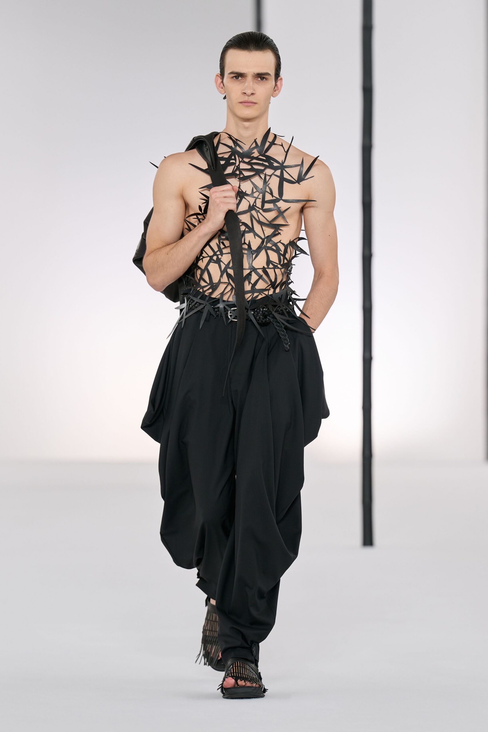 black embellished top and relaxed pants