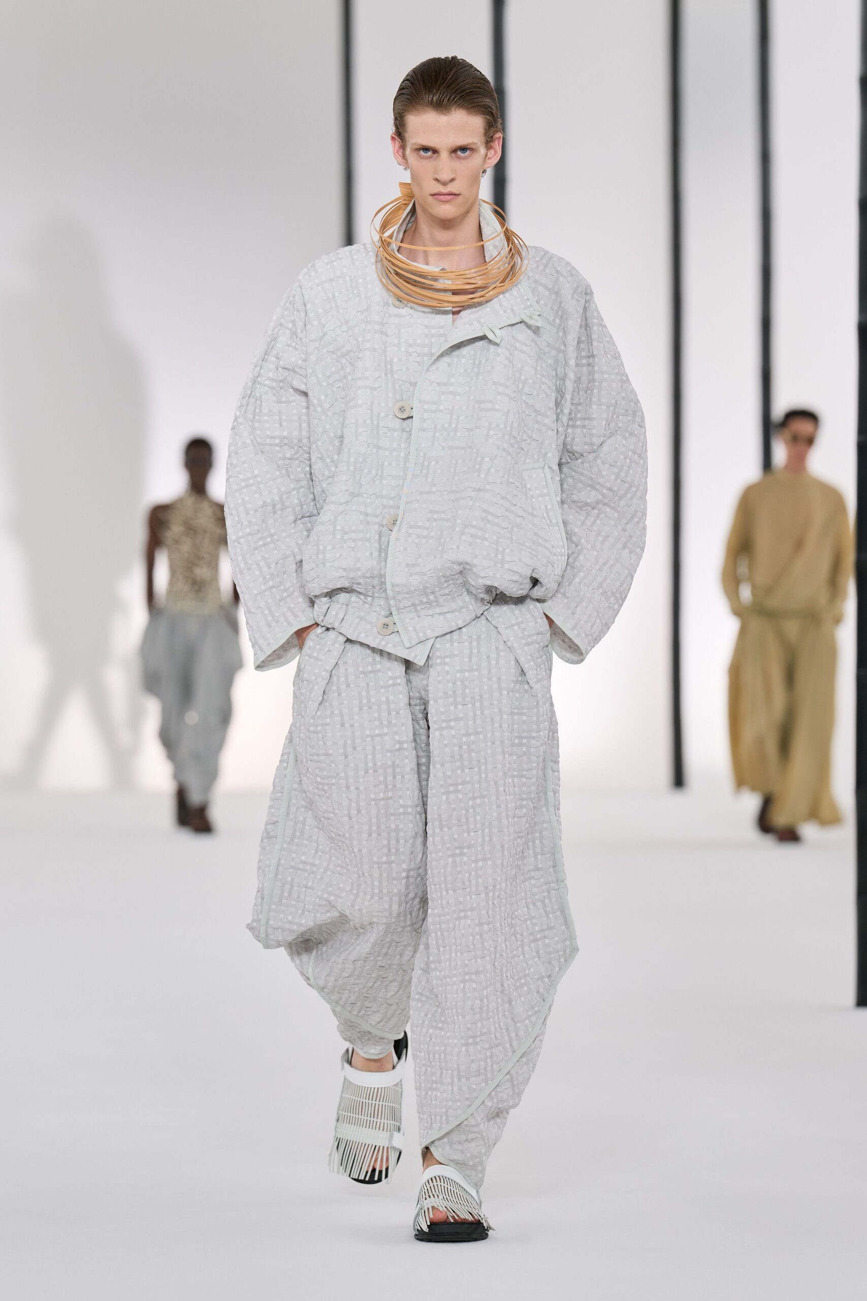 gray quilted jacket and pants