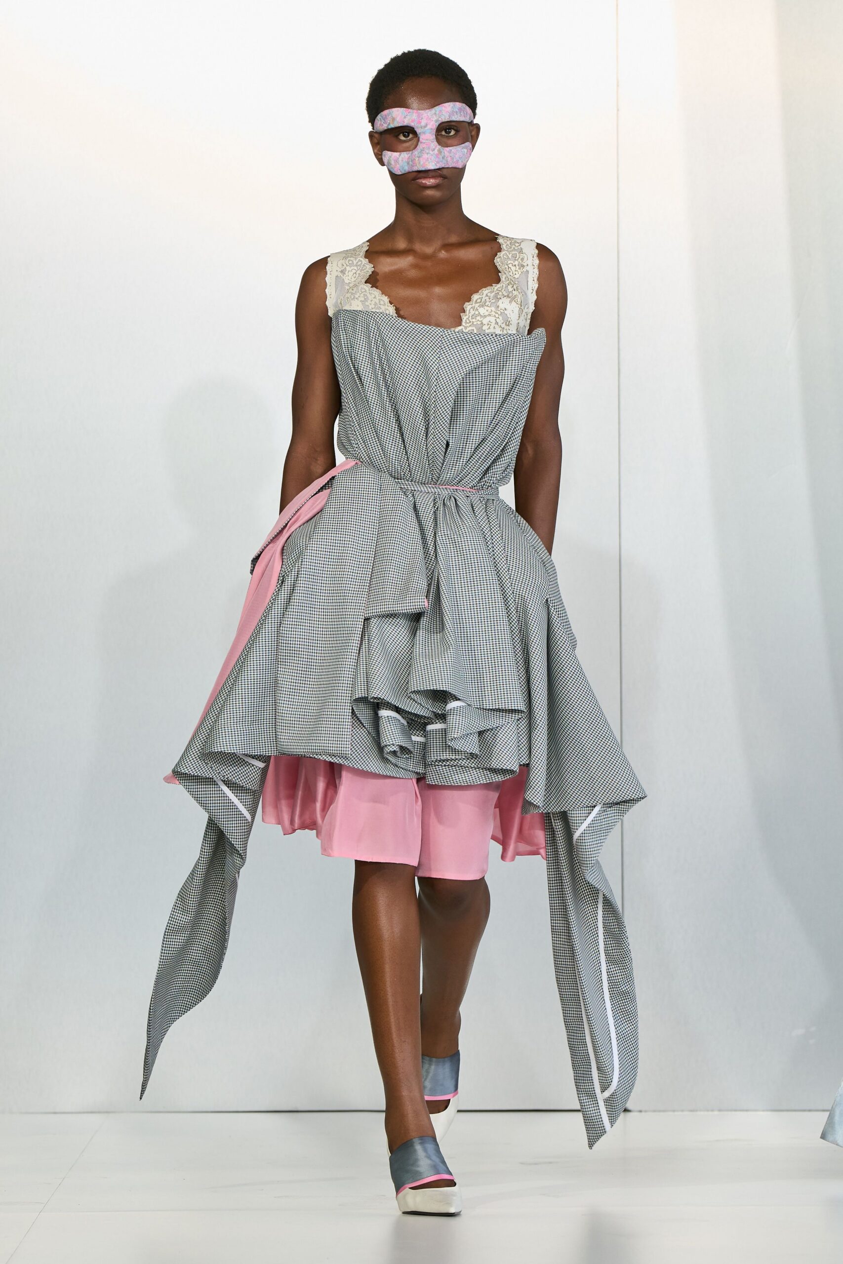 gray and pink layered dress with blue shoes