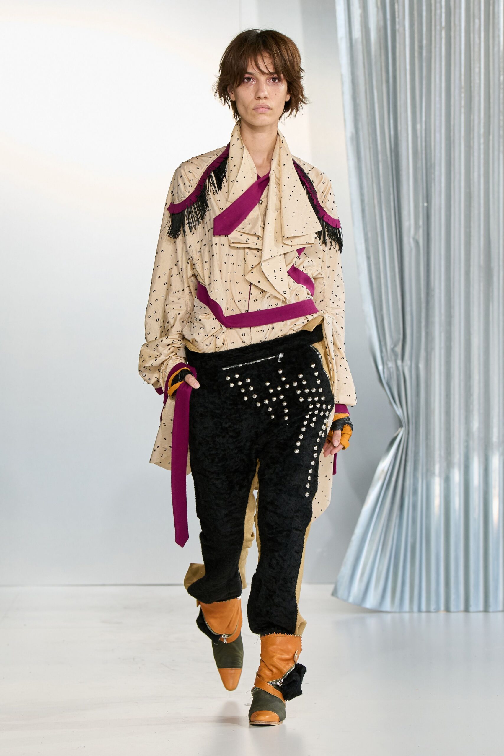 beige polka-dot shirt with black velvet pants