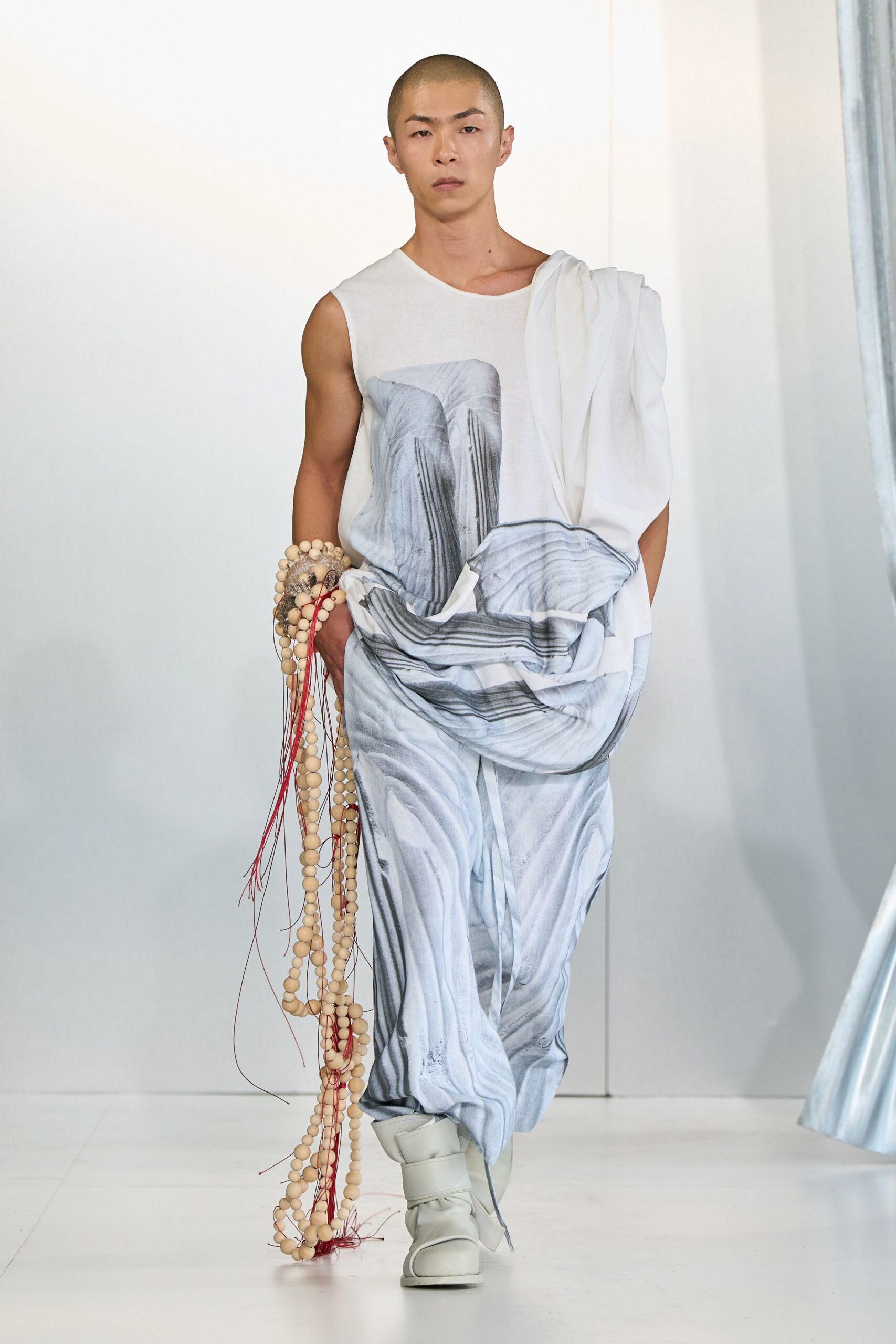 white cotton sleeveless high-neck fitted printed top