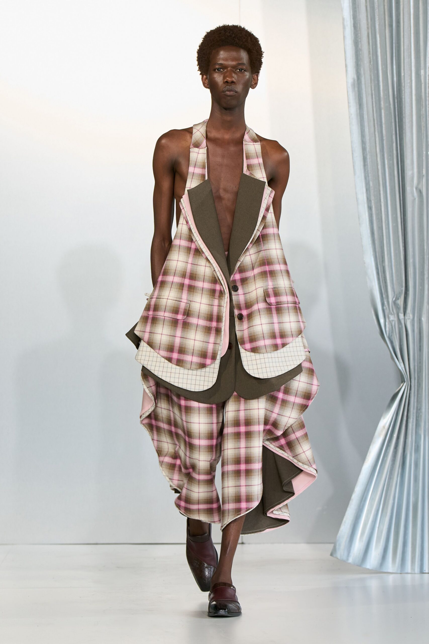 plaid sleeveless jacket and flared pants