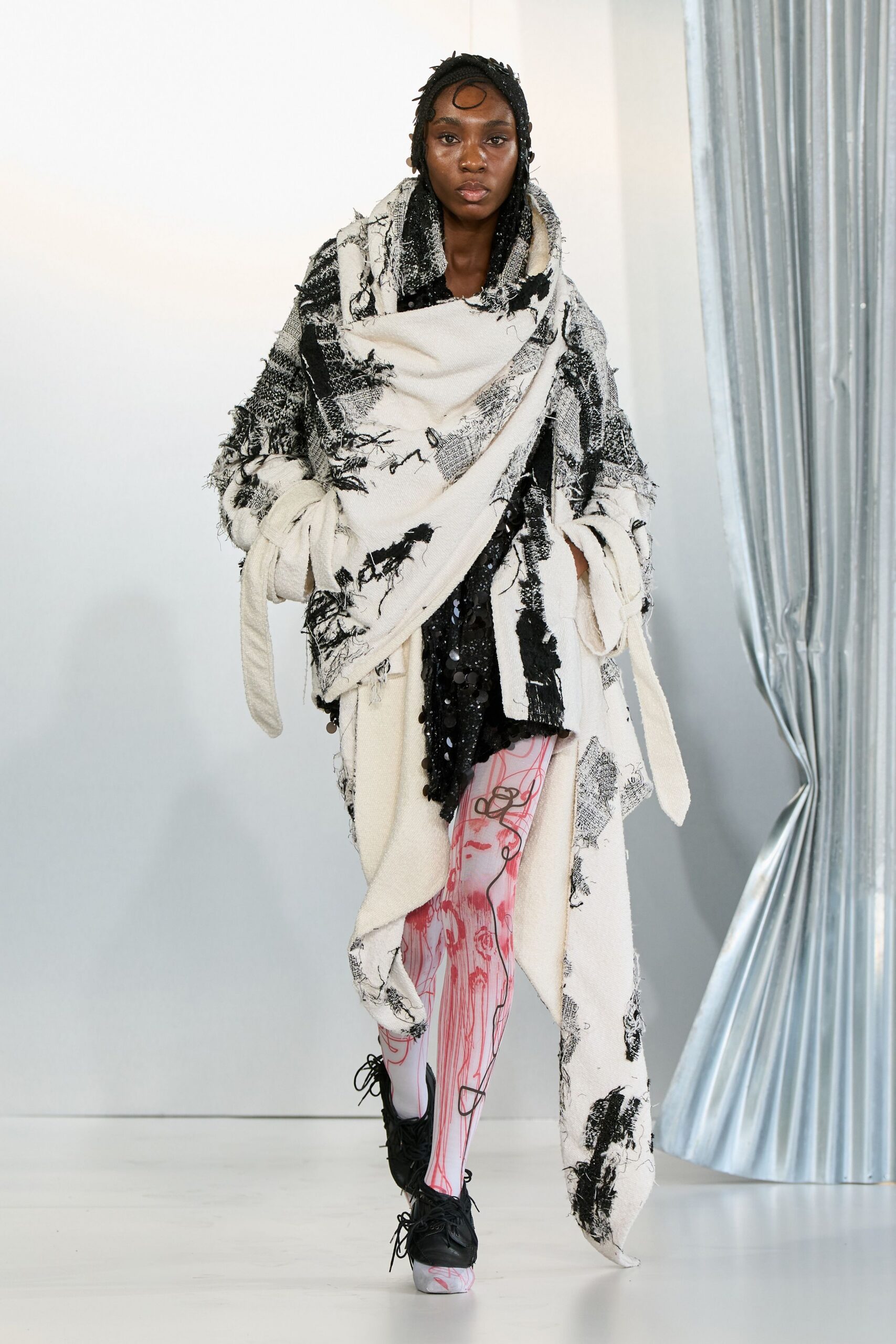 layered black and white coat