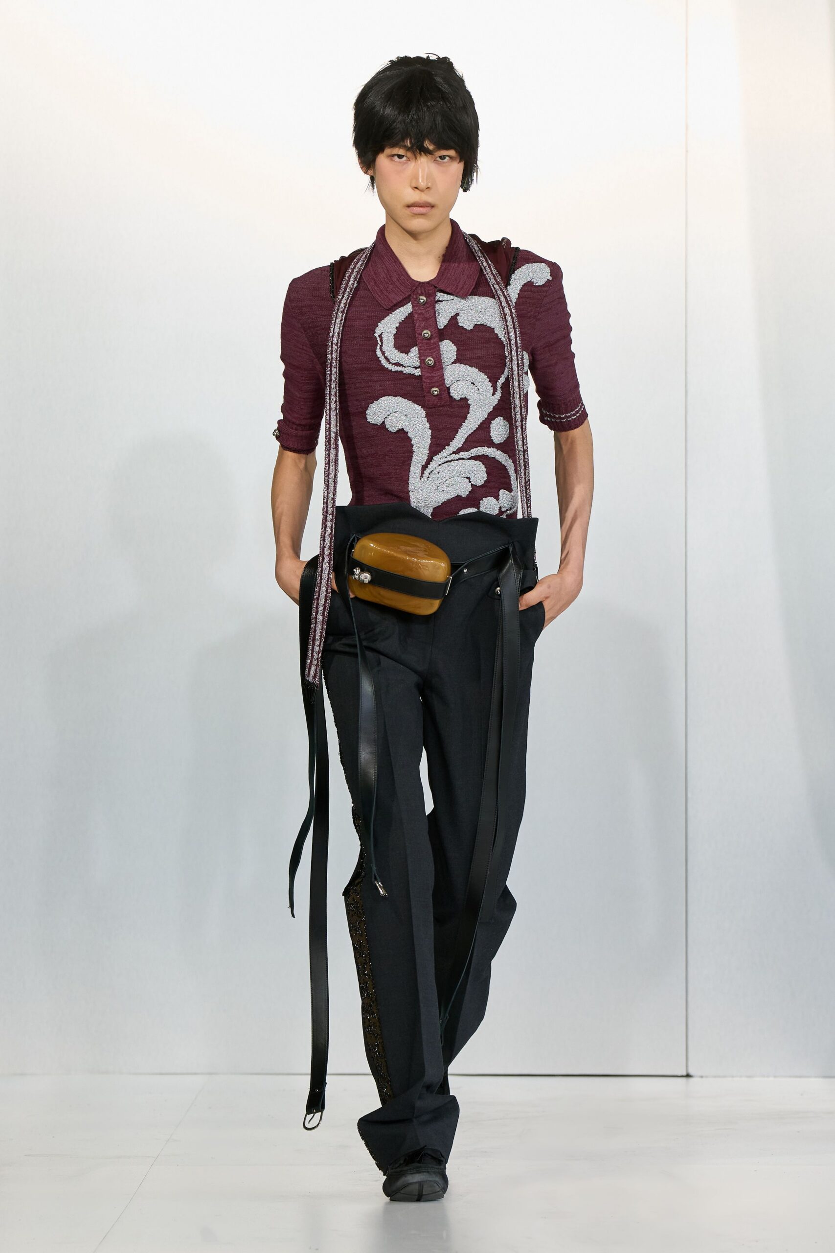 purple embroidered shirt with black pants
