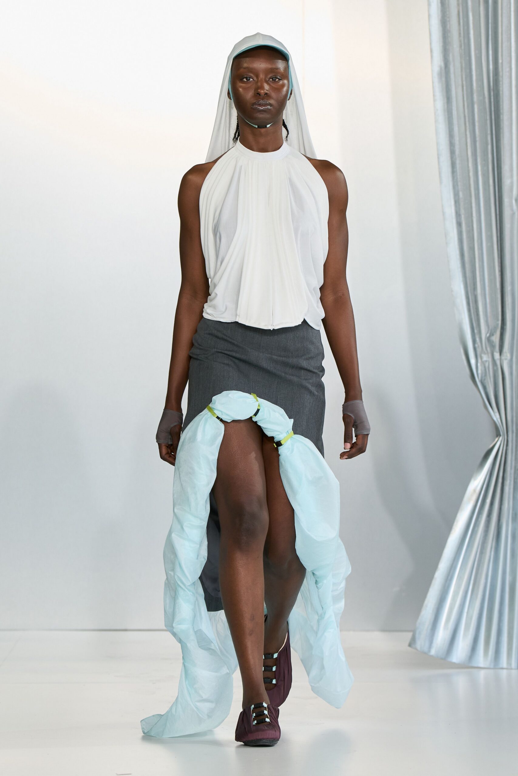 white silk sleeveless high-neck fitted draped top