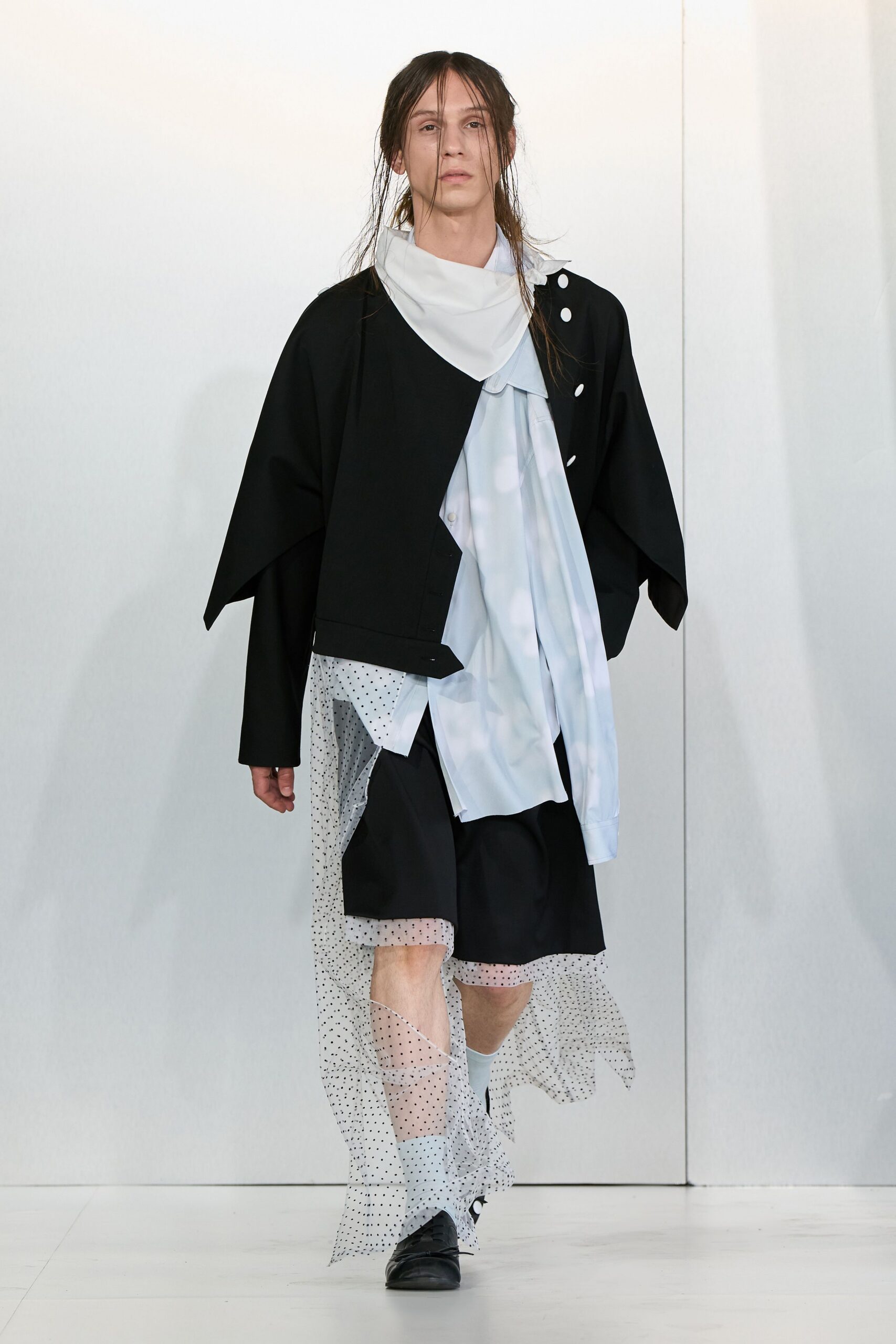 black relaxed jacket with white shirt