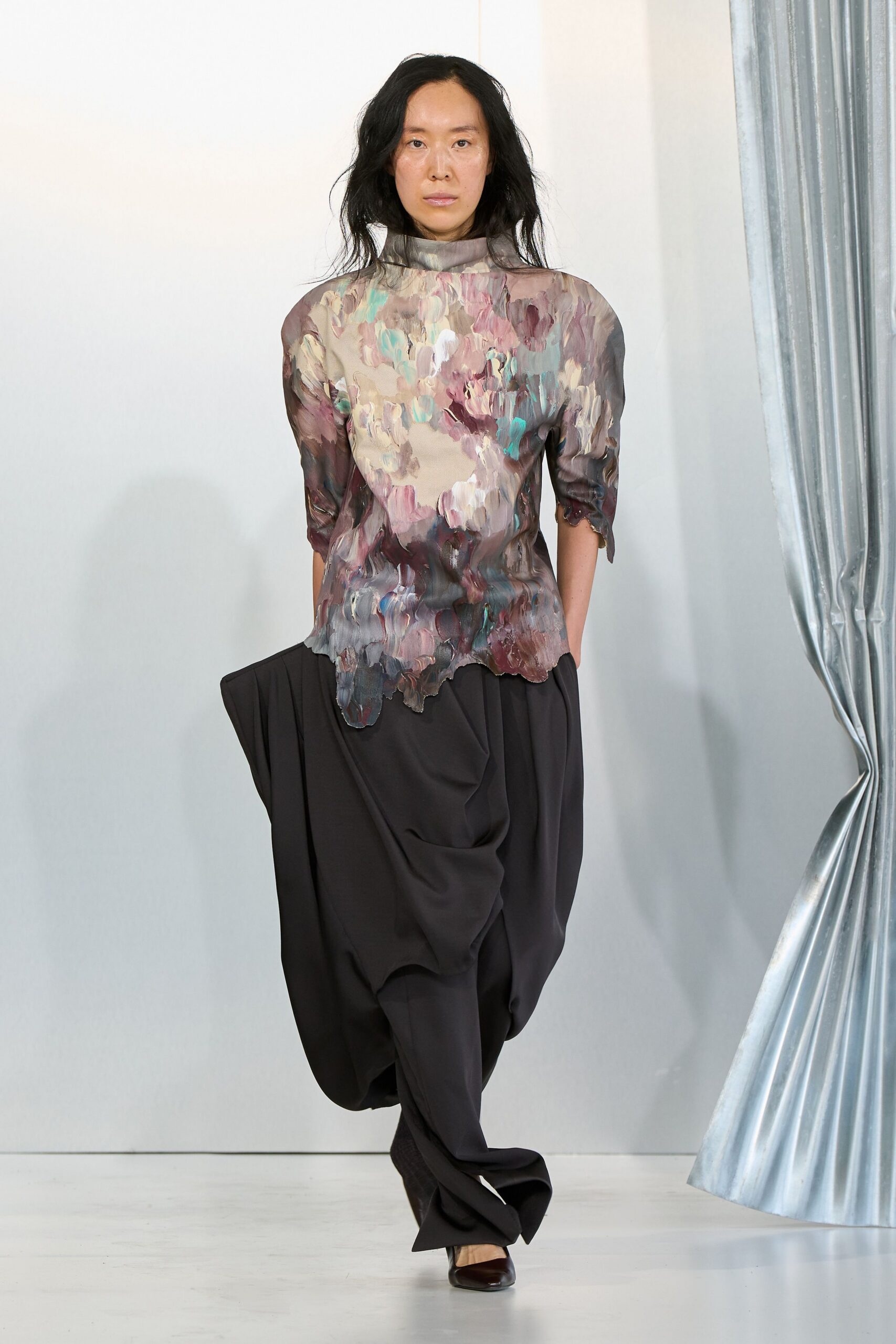 multi-colored relaxed top with black pants