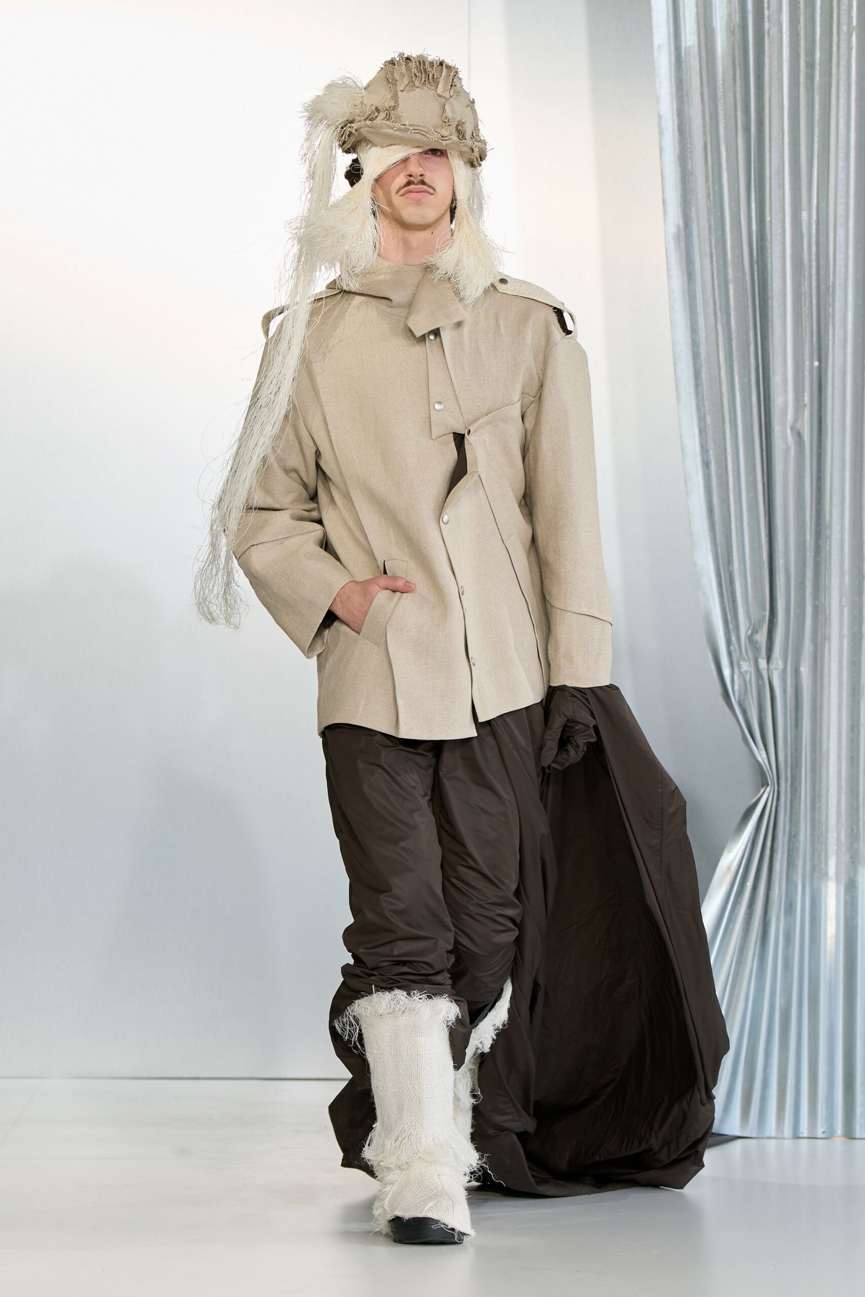 beige jacket brown pants white shoes