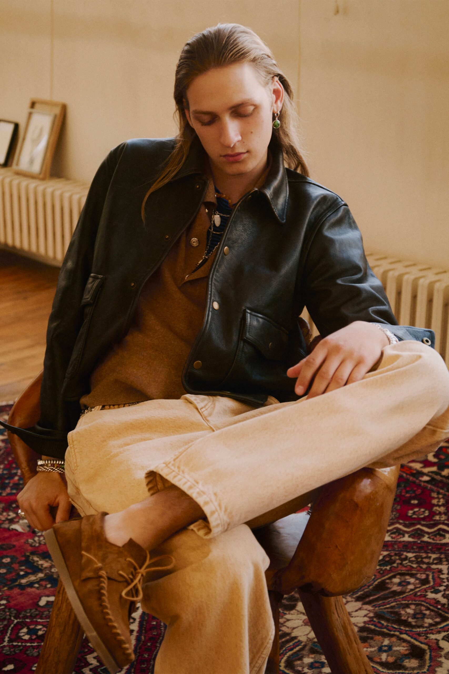 black leather long-sleeve collared fitted jacket