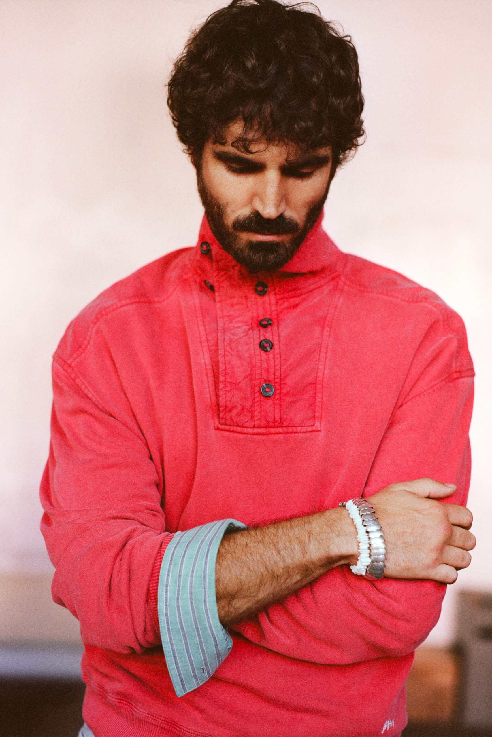 red cotton long-sleeve collared relaxed buttoned sweater