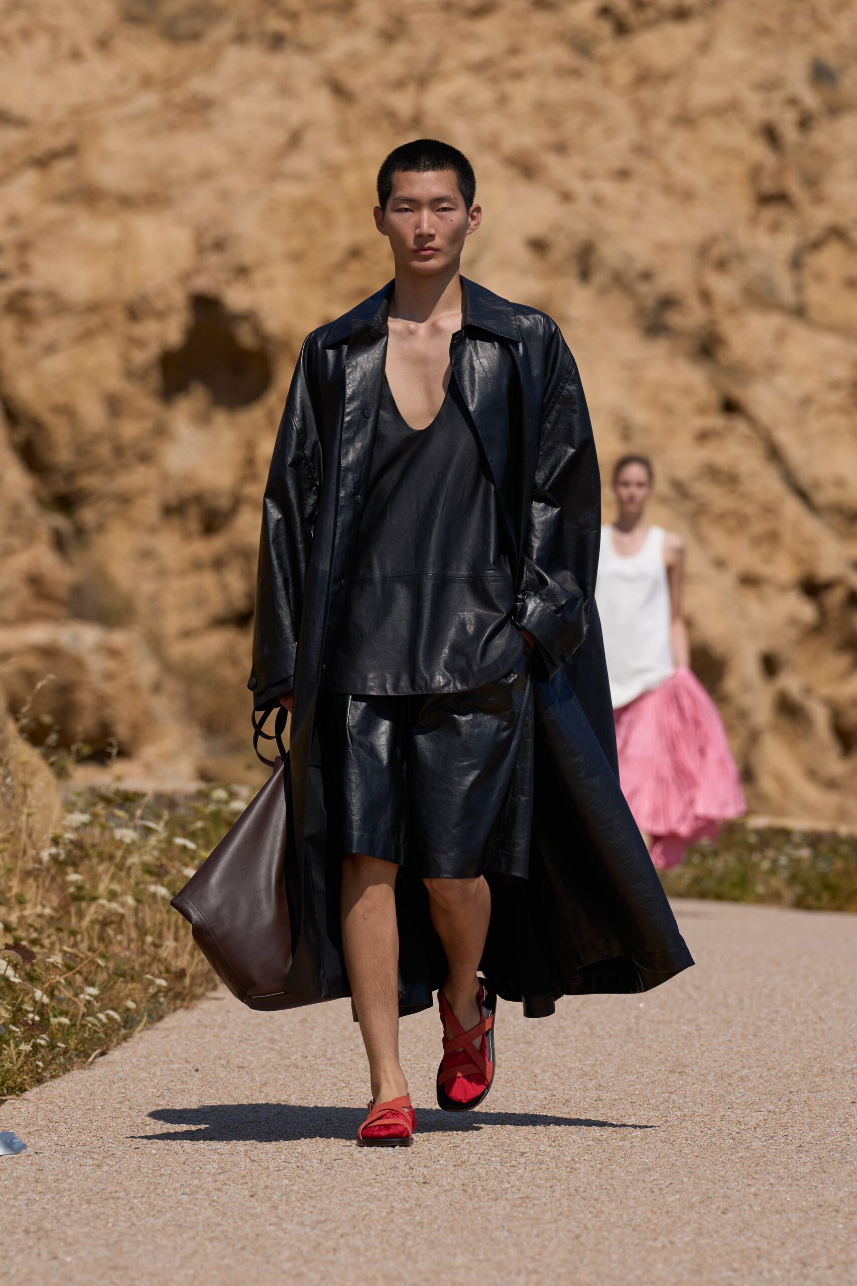 black leather sleeveless v-neck fitted top