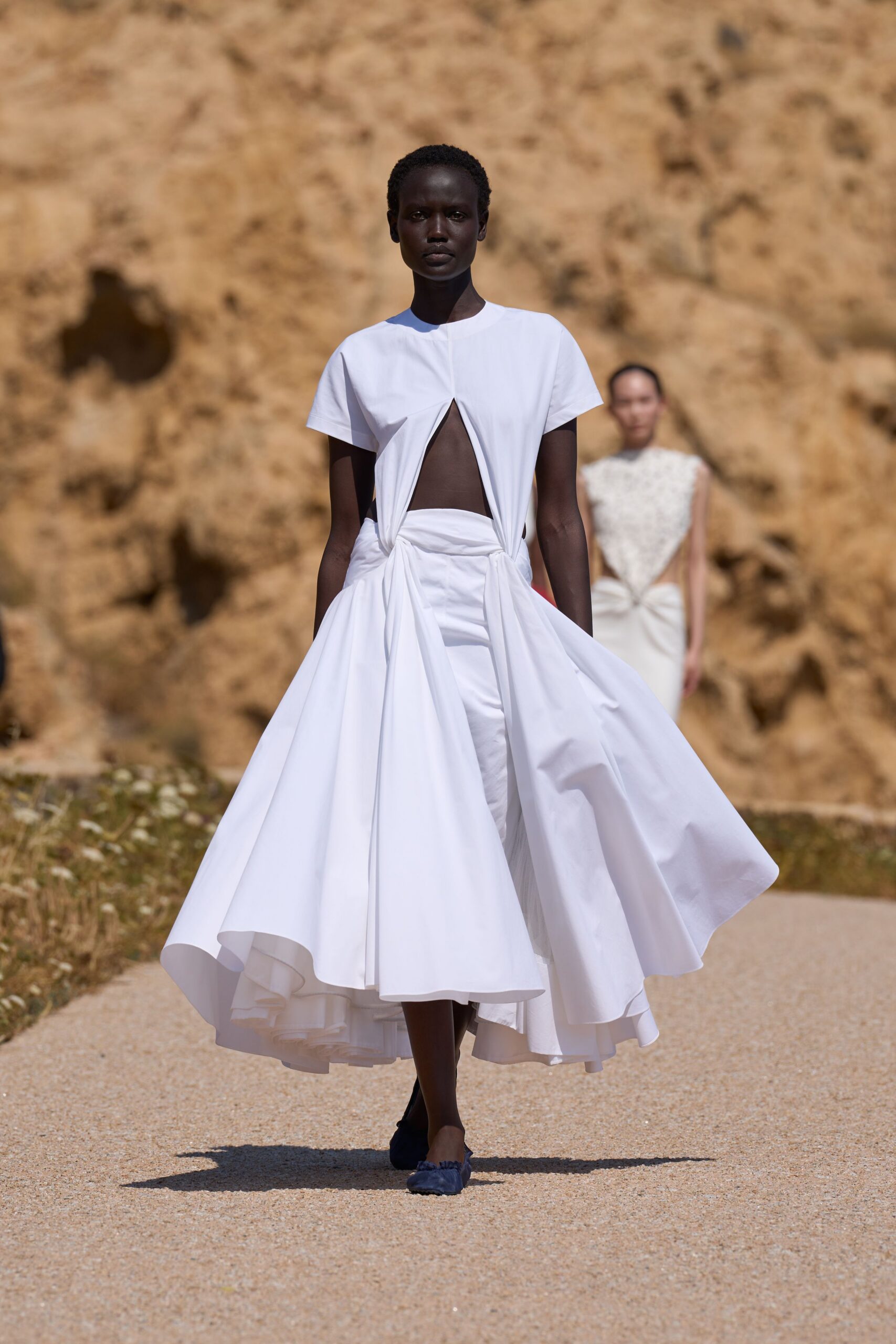 white cotton sleeveless v-neck fitted pleated layered dress