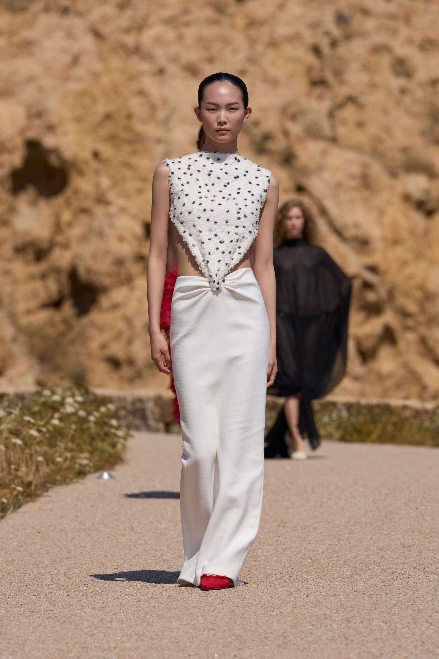 white fitted top with red shoes