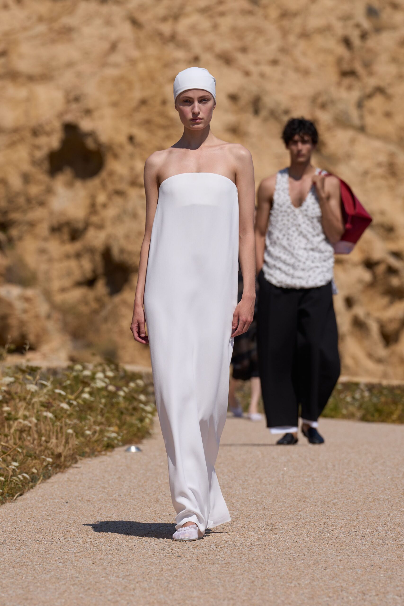 white strapless flowing gown
