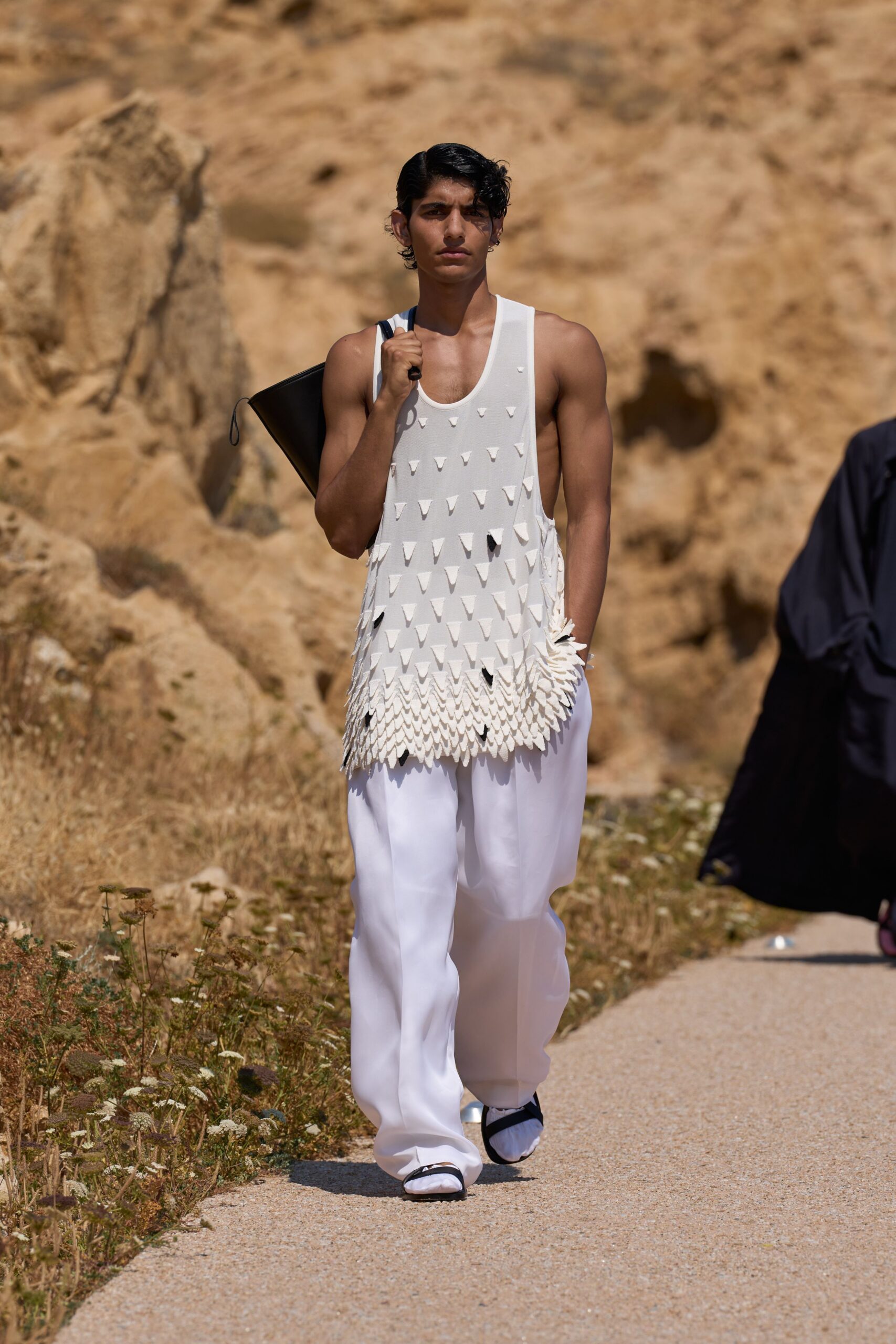white tank-top and relaxed pants