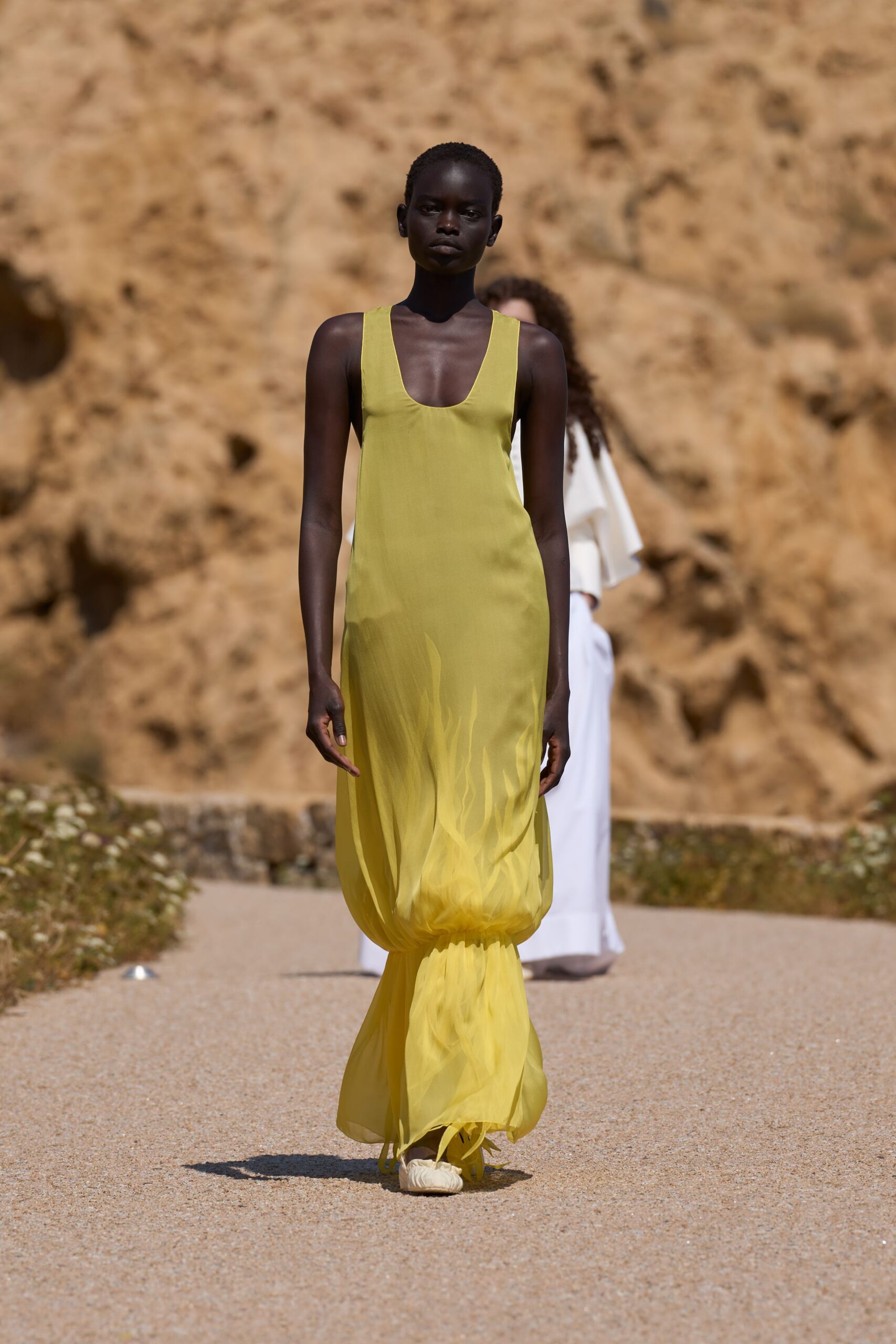 yellow silk sleeveless v-neck fitted flowing maxi gown