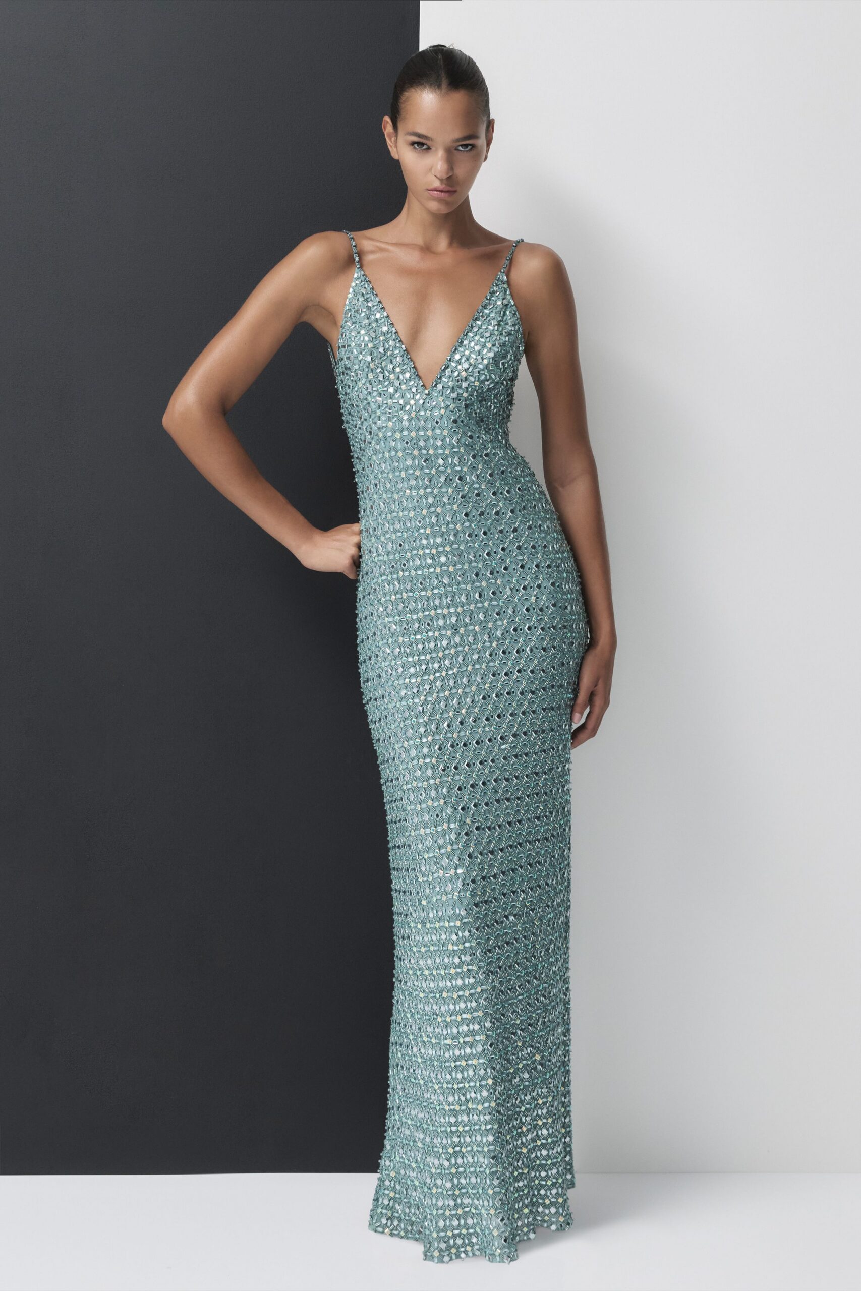 teal embellished sleeveless gown