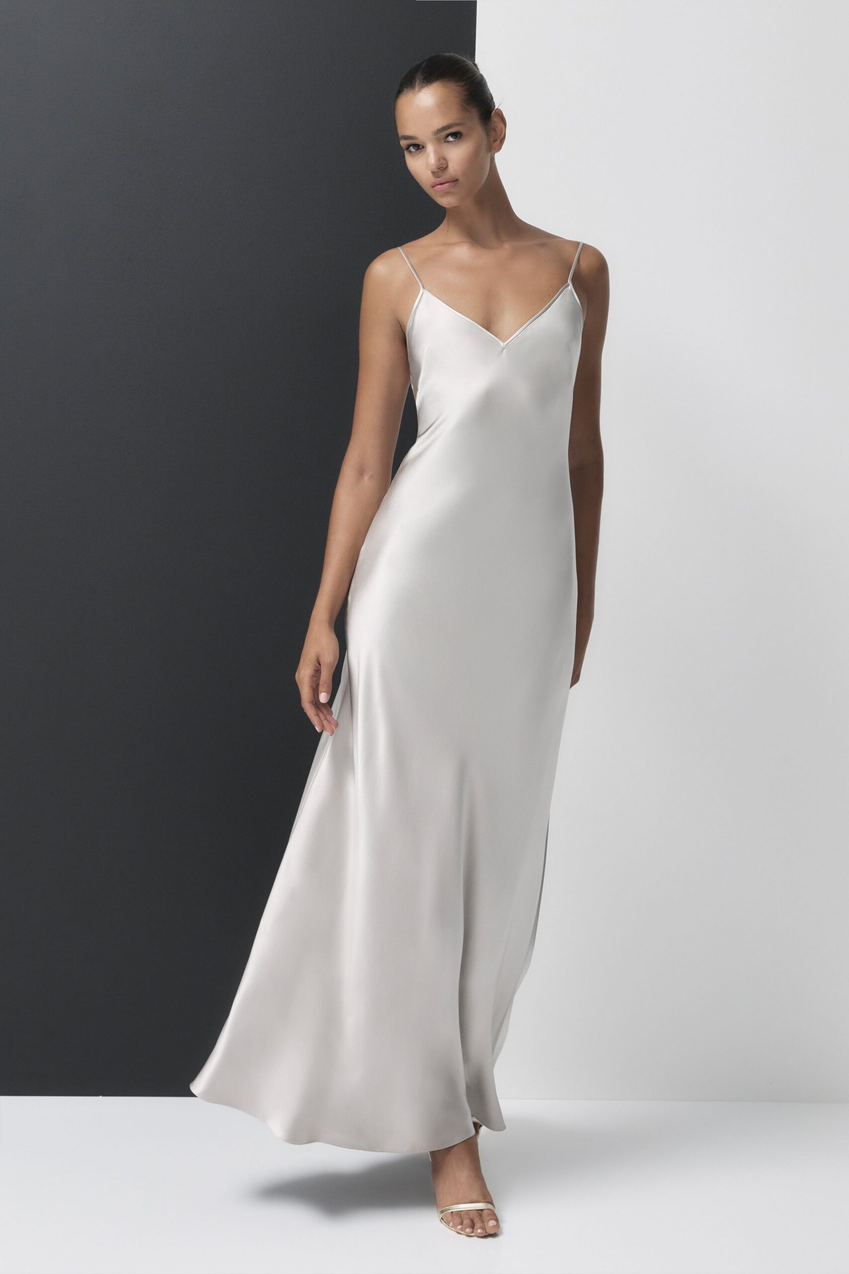 gray silk sleeveless v-neck fitted flowing maxi gown