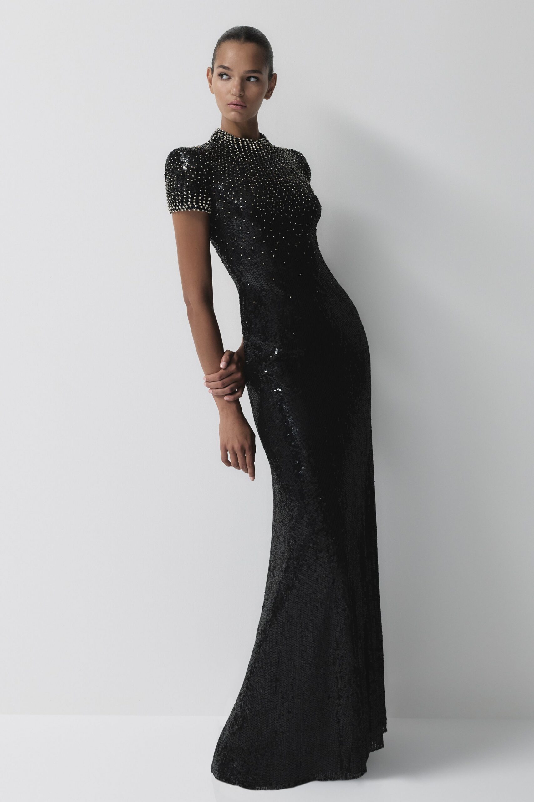 black sequined high-neck gown
