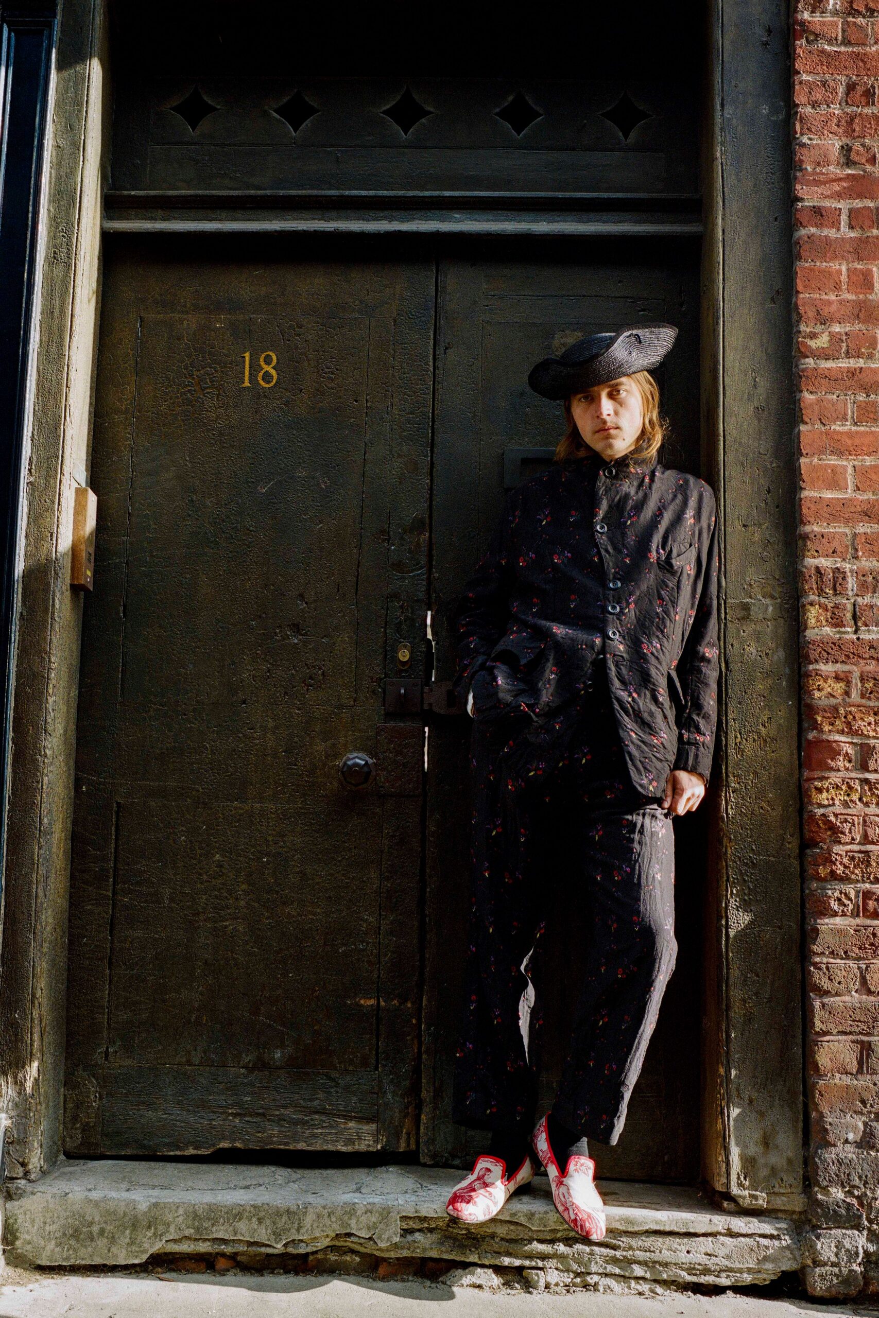 black floral suit with hat and shoes
