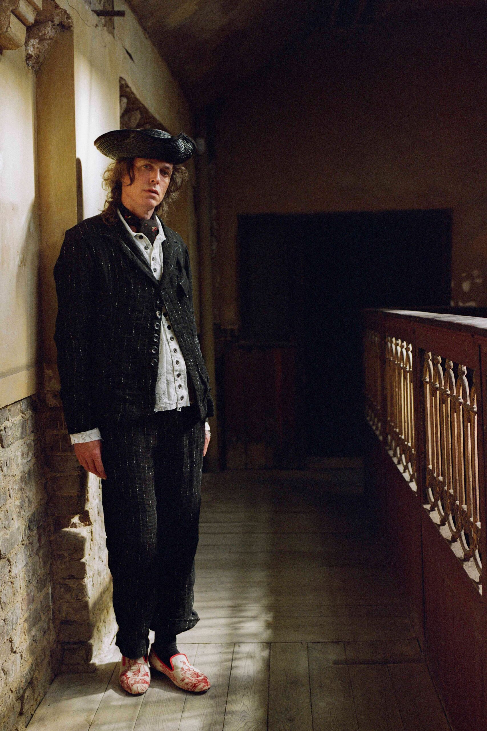 black cotton long-sleeve collared structured buttoned blazer