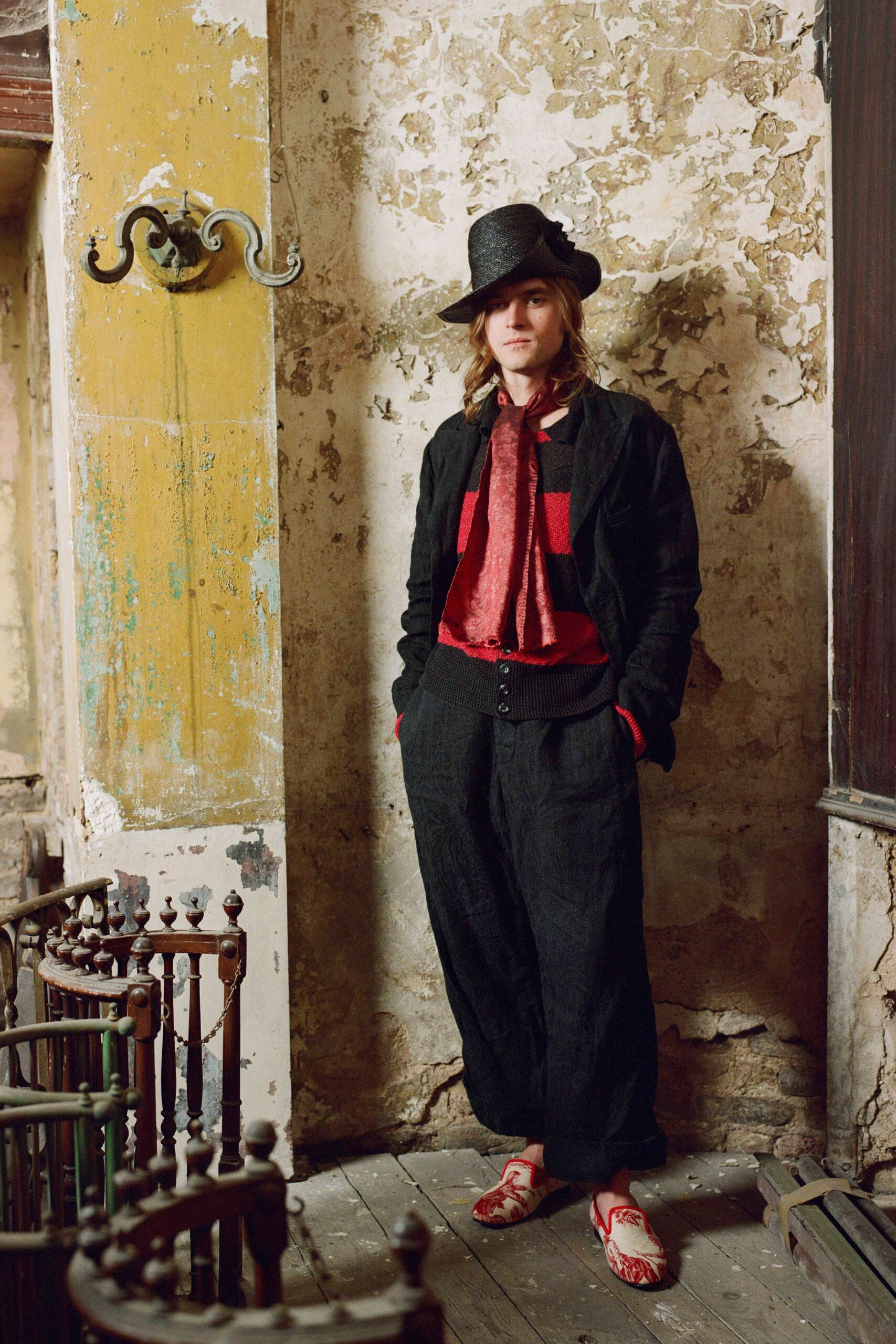 black jacket red shirt relaxed pants