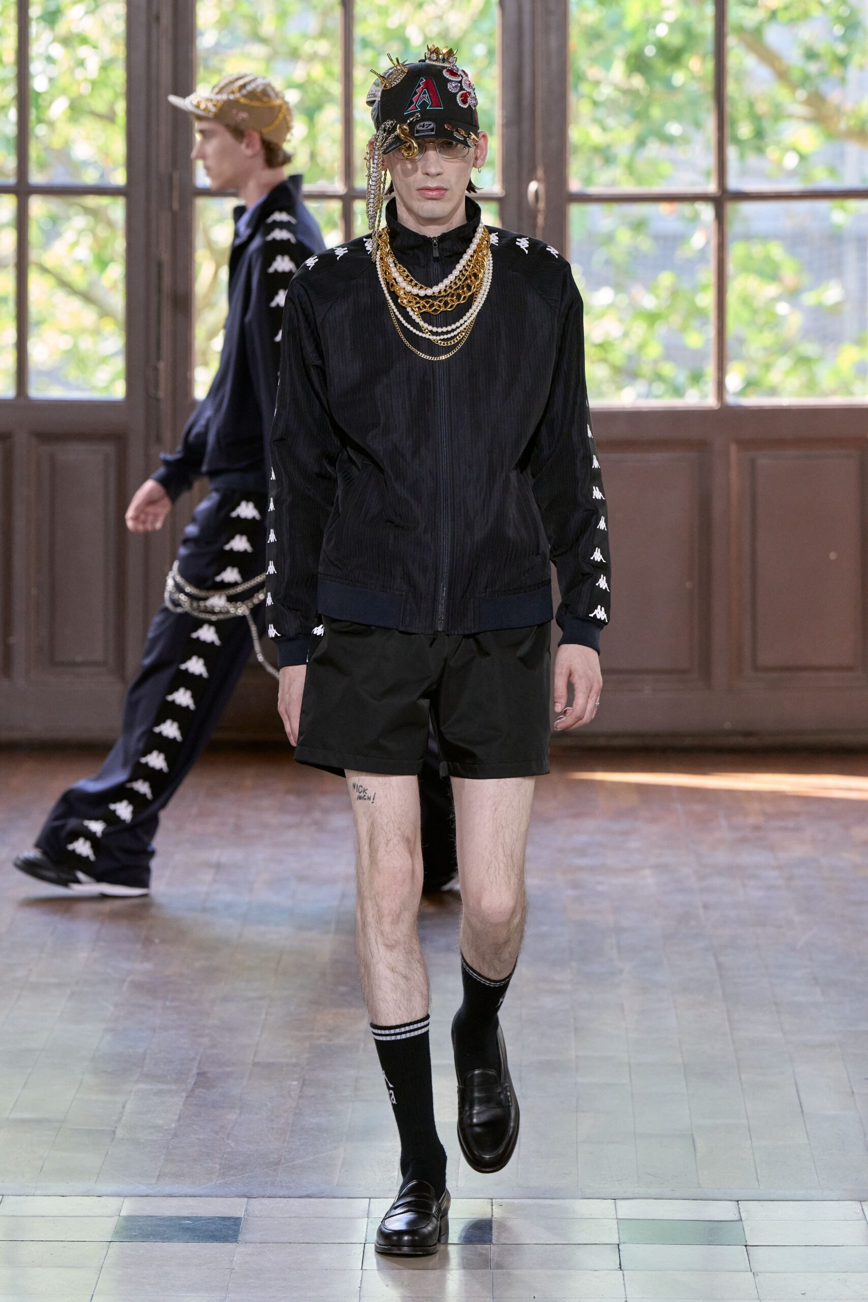 black fitted jacket and shorts