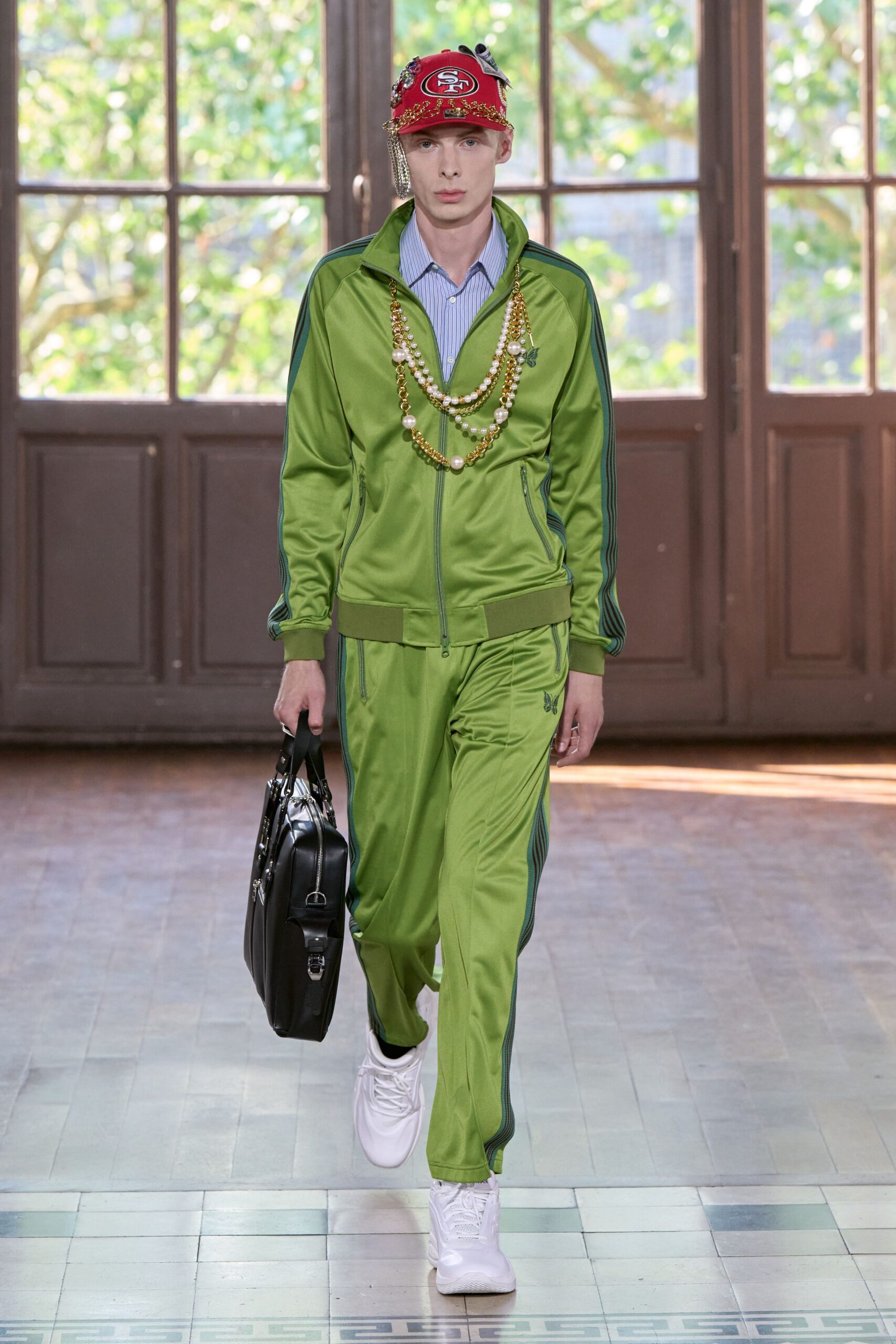green satin tracksuit with accessories