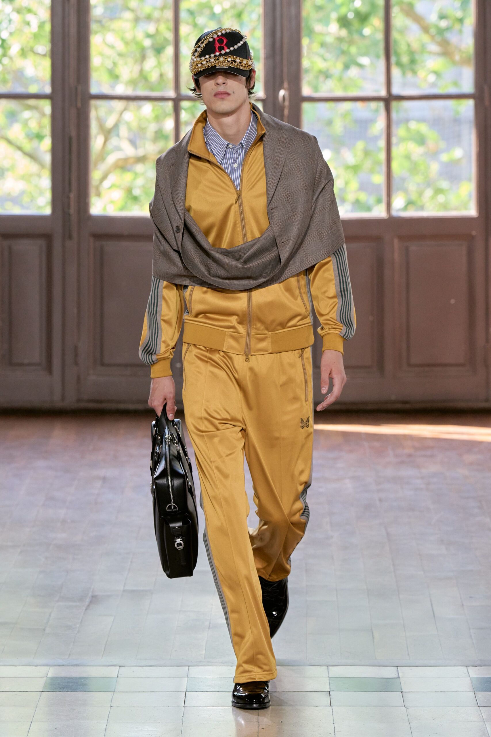 gray jacket blue top yellow pants