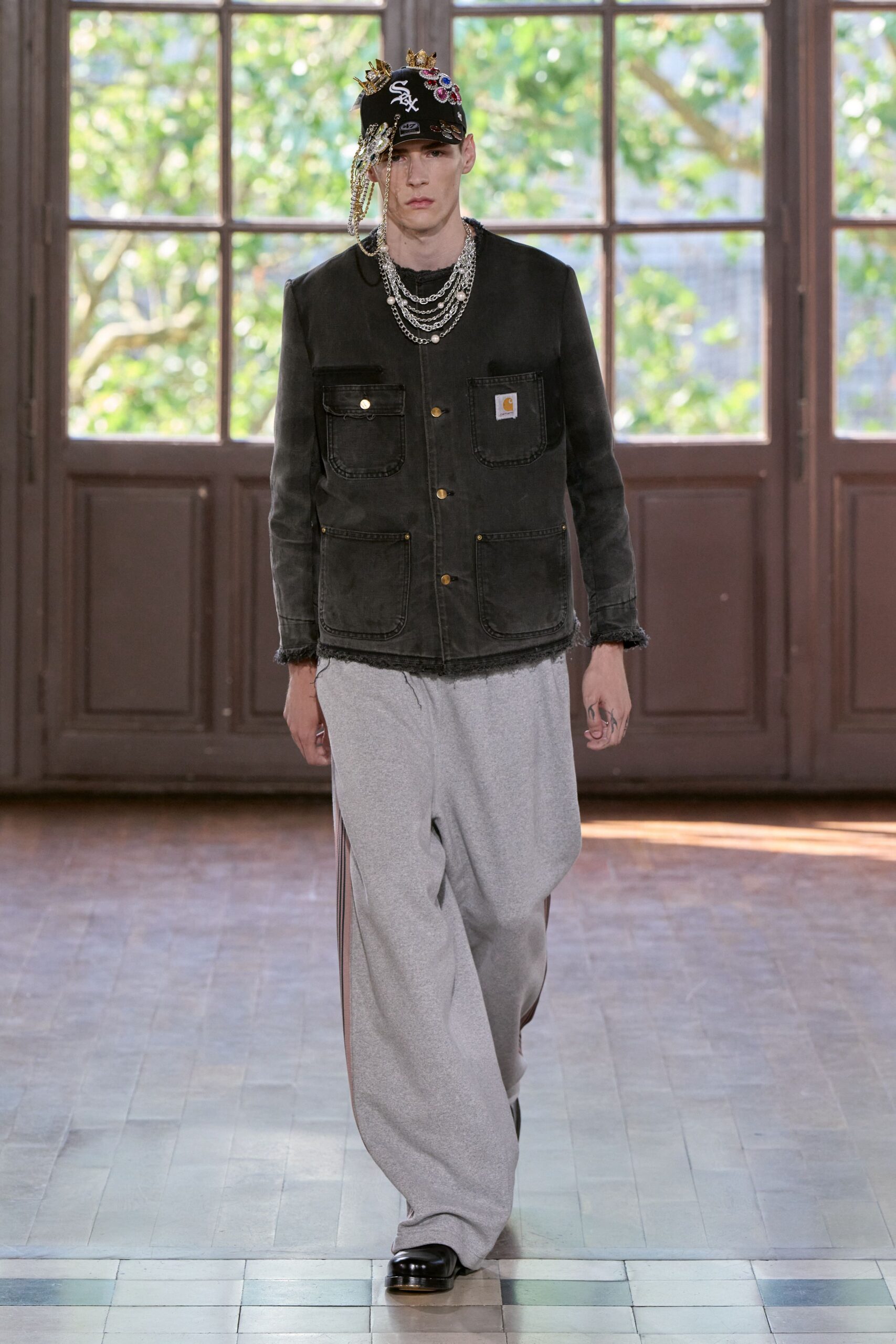 black relaxed jacket with gray pants