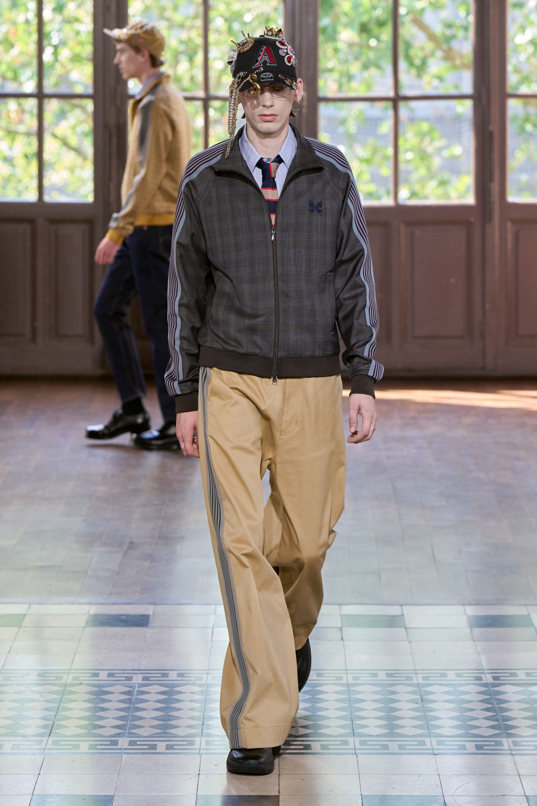 black jacket beige pants outfit