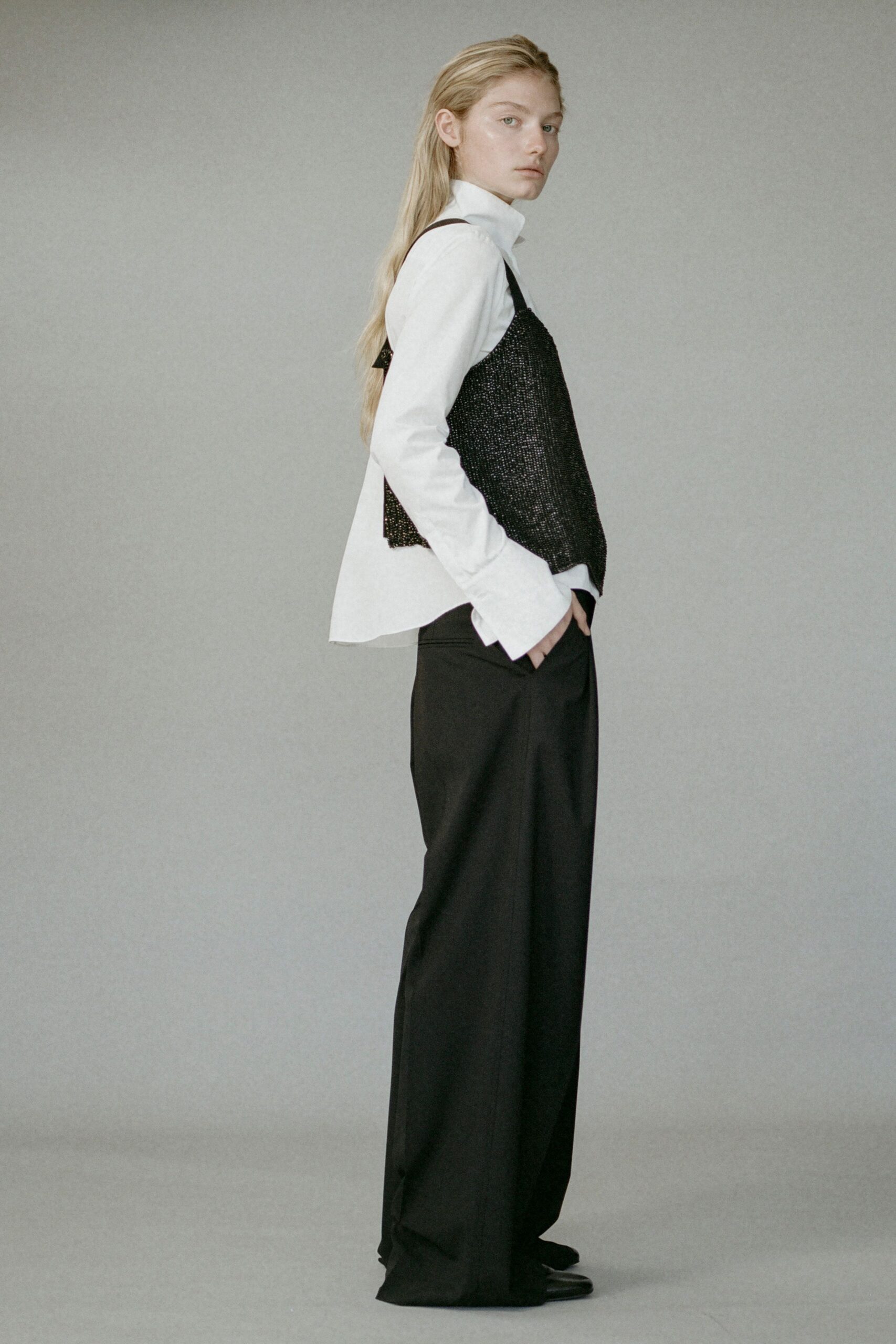 black silk sleeveless fitted layered top