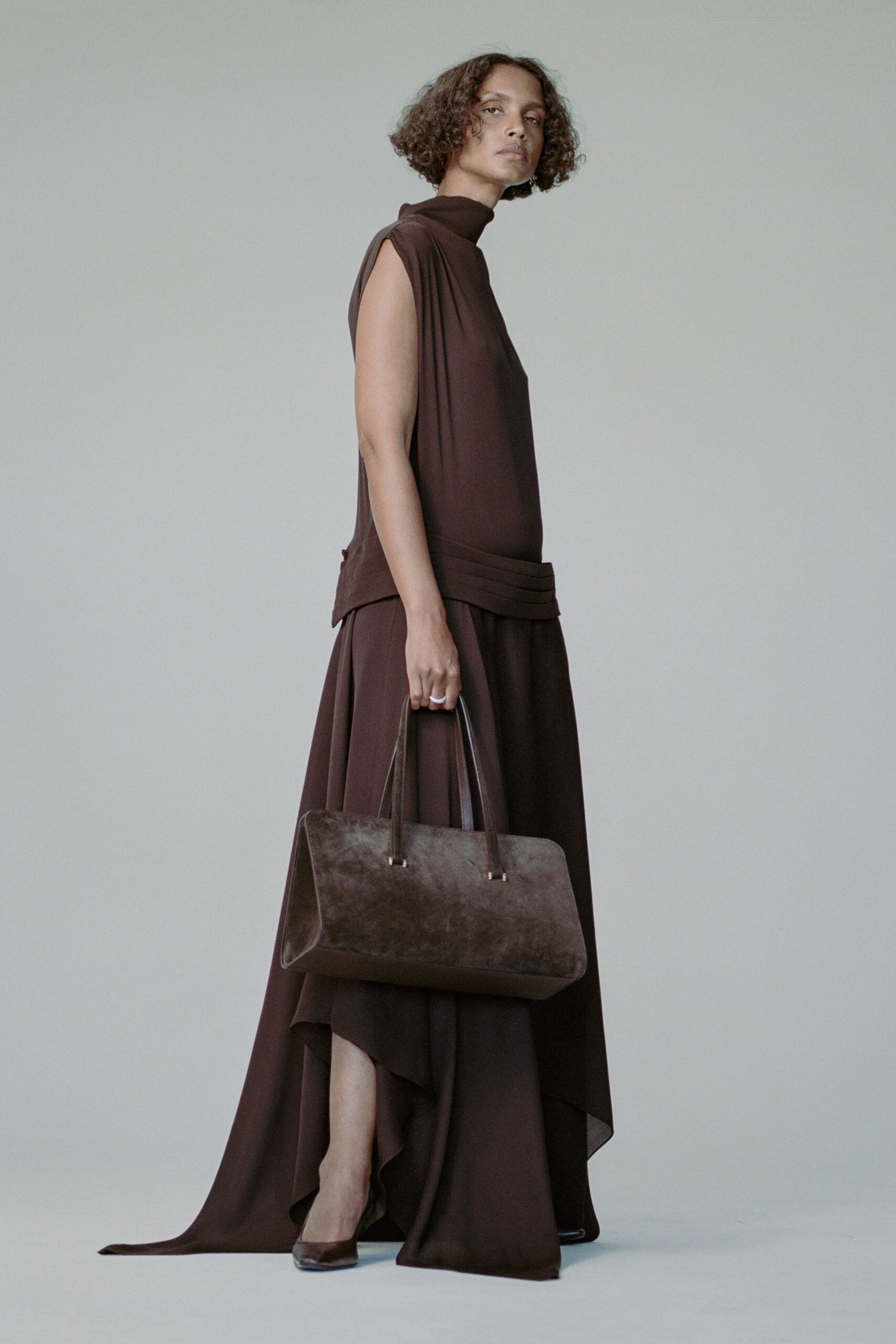 brown silk sleeveless high-neck fitted draped flowing dress