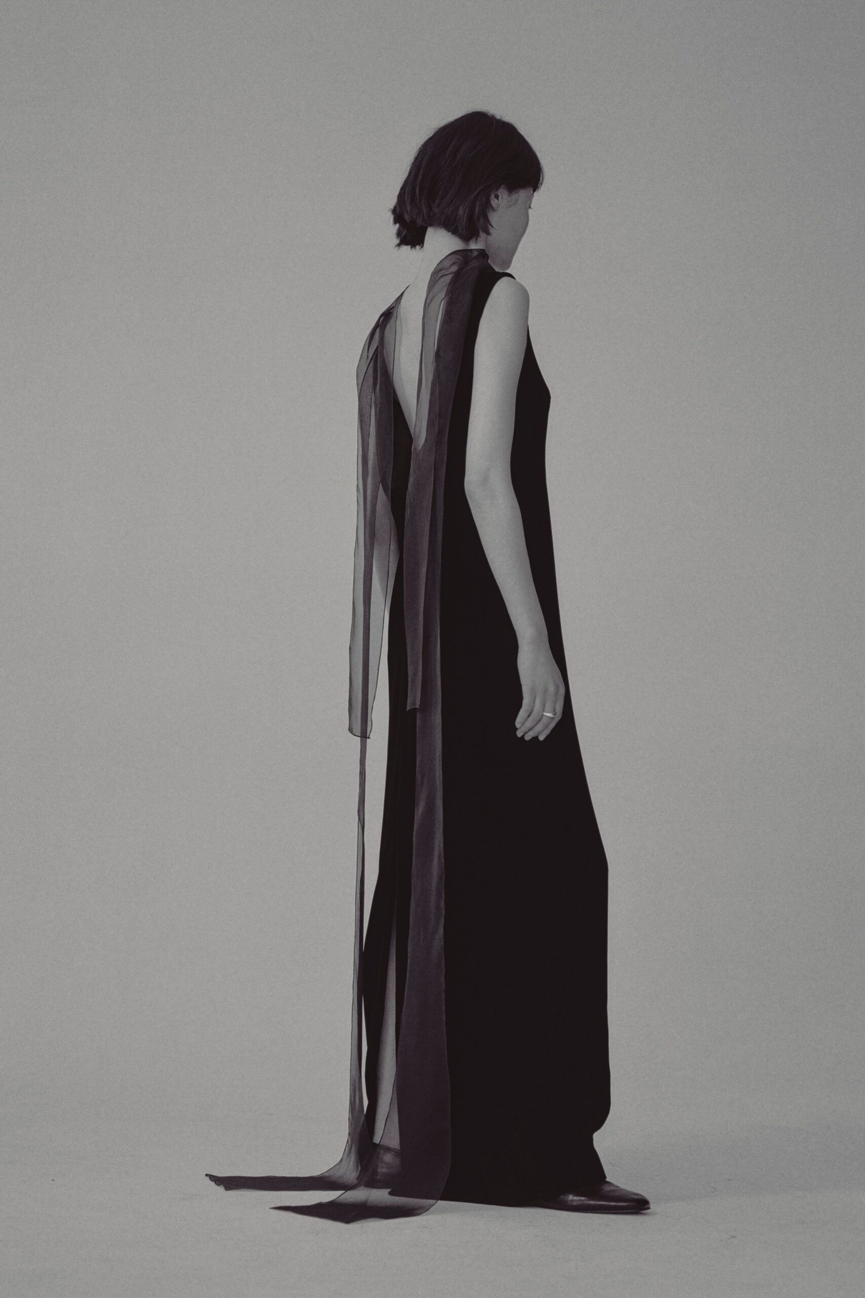 black silk sleeveless gown