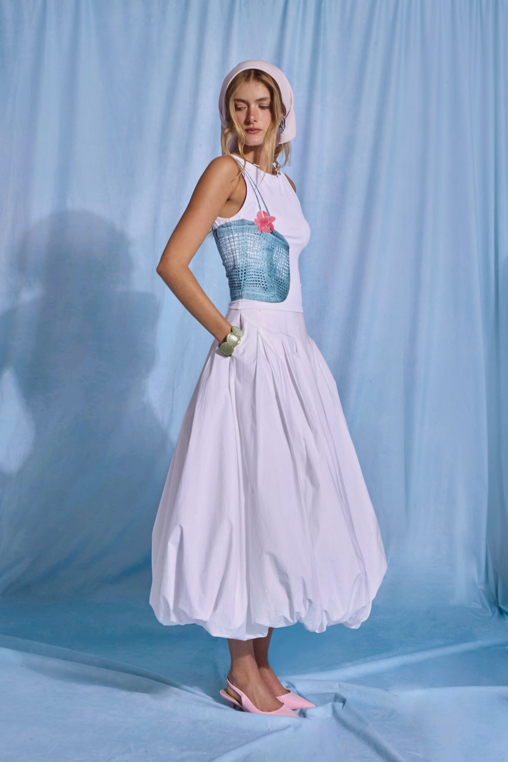 white cotton sleeveless high-neck fitted pleated pockets dress