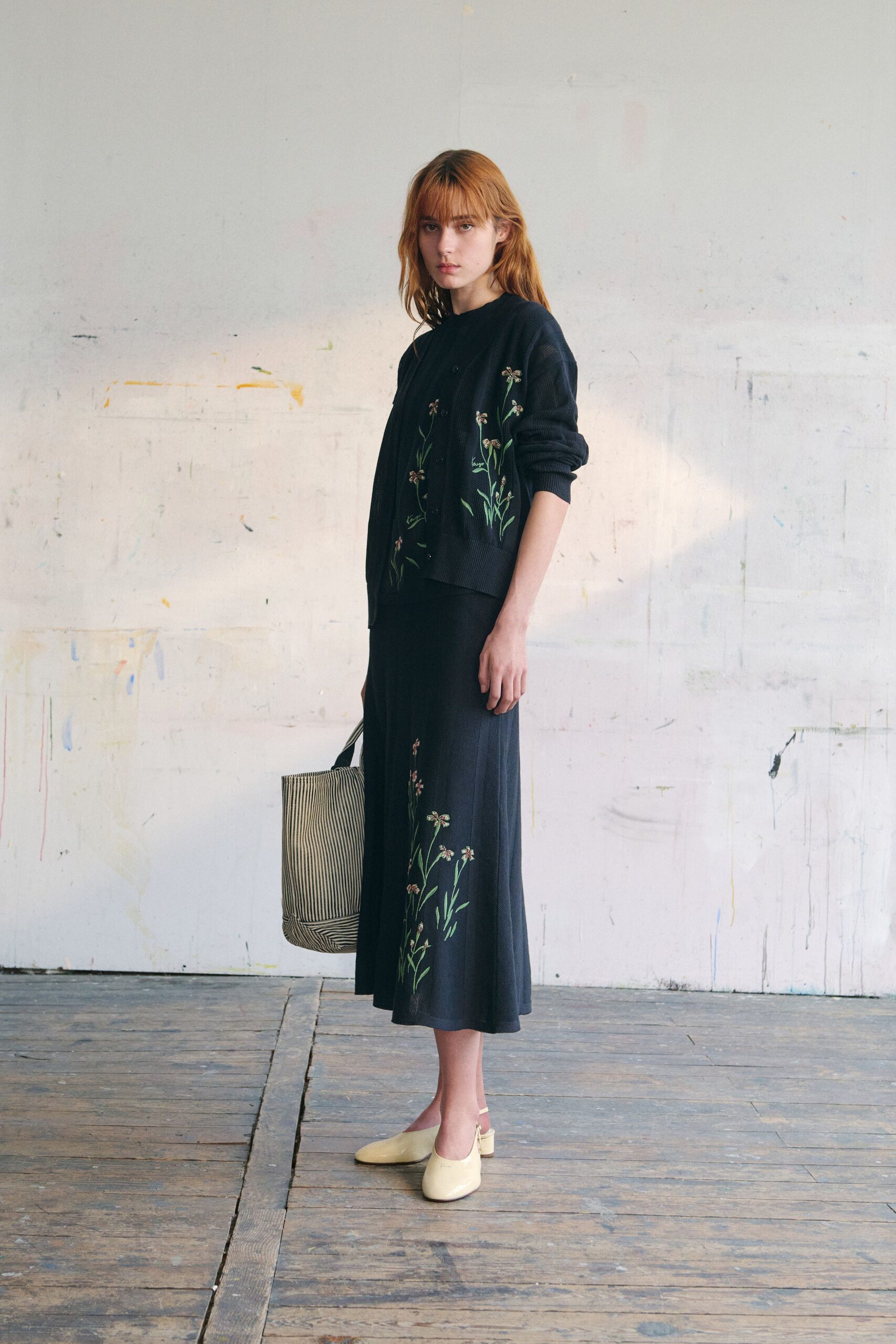 black cotton fitted flared midi skirt