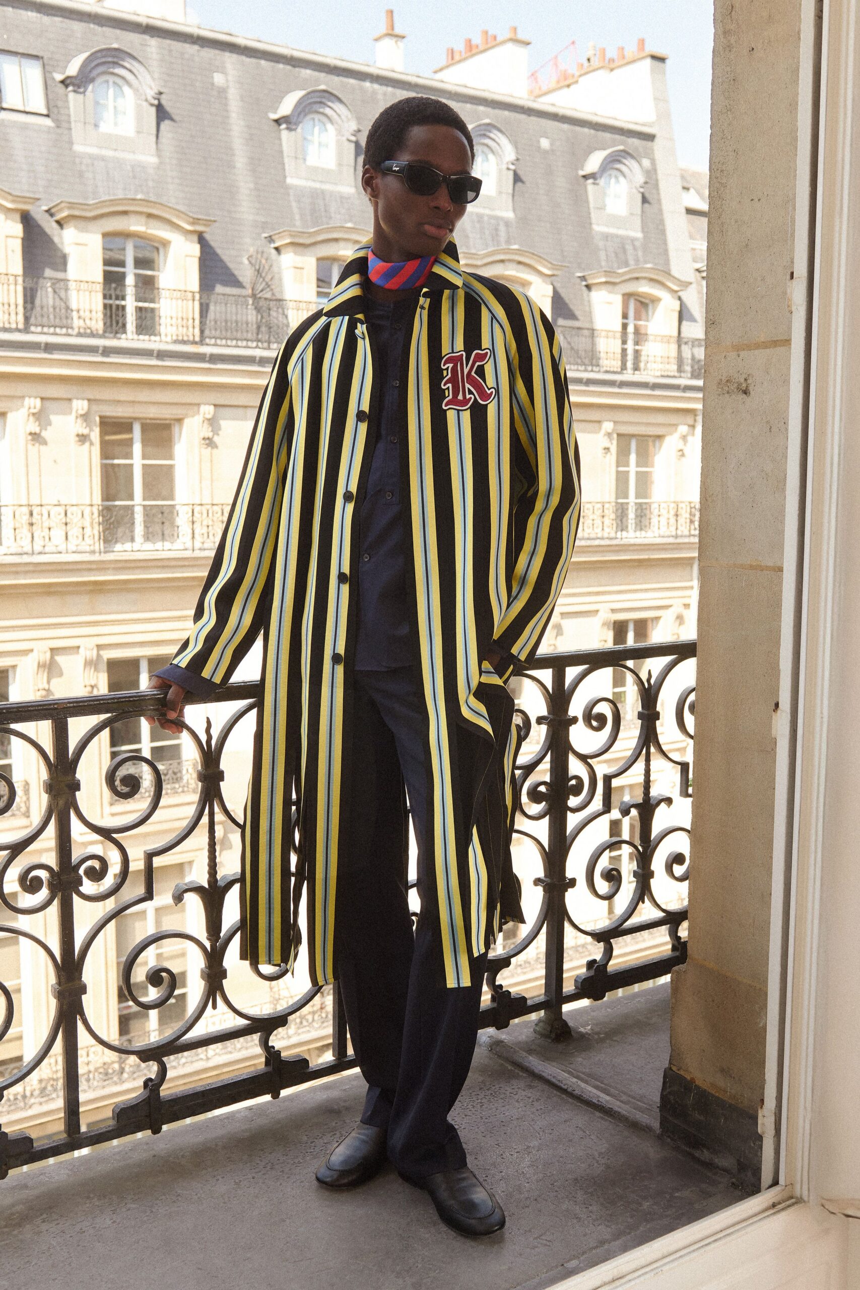 black cotton long-sleeve collared relaxed striped coat