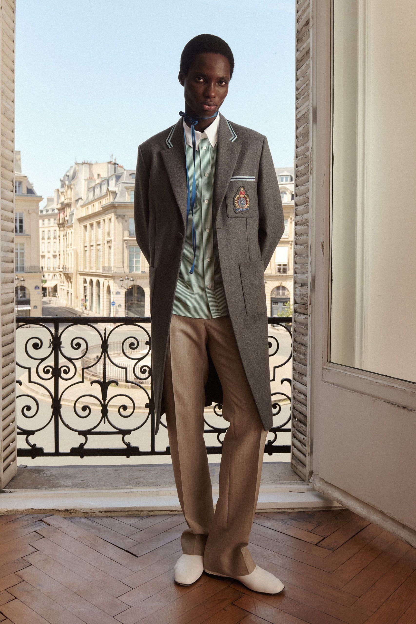 gray wool long-sleeve collared structured buttoned coat