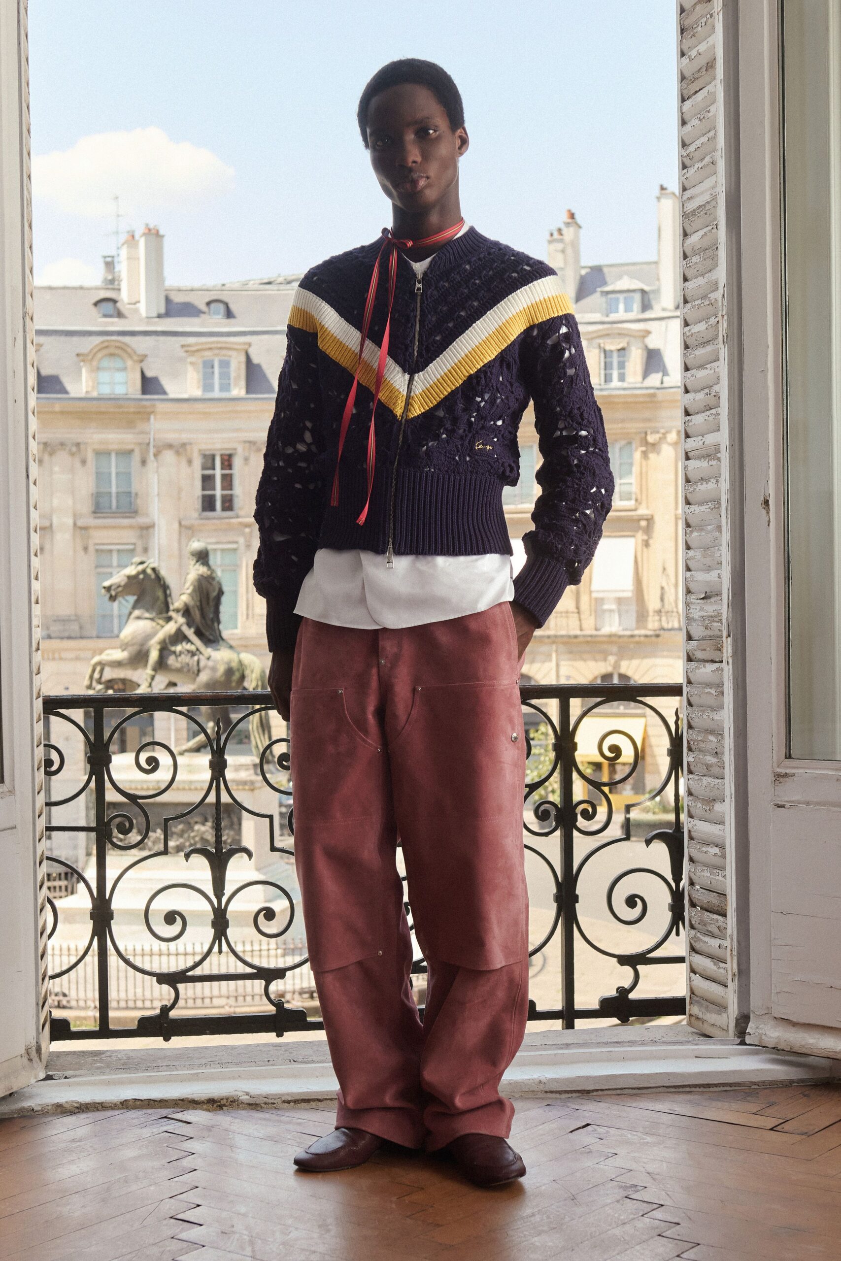 navy sweater with white shirt and pink pants