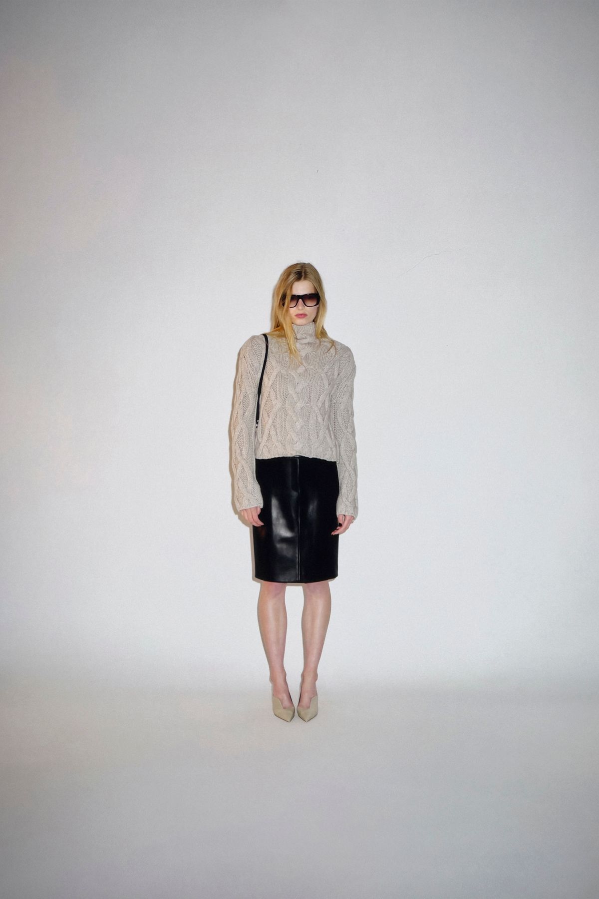 beige wool long-sleeve high-neck relaxed sweater