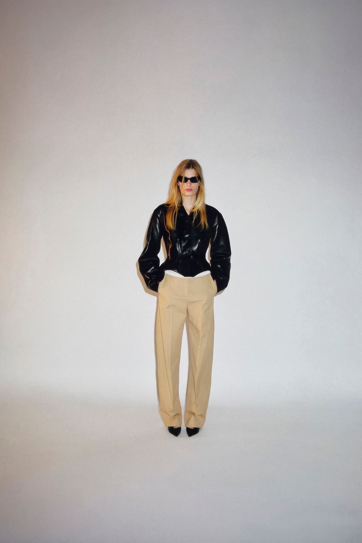 black leather long-sleeve collared fitted jacket
