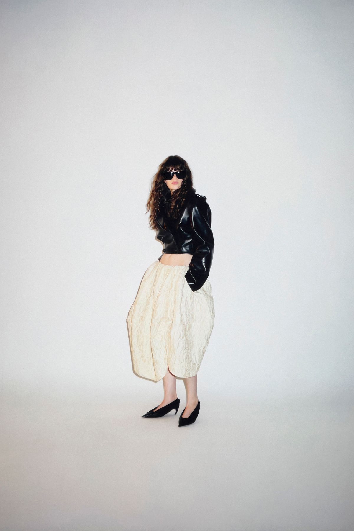 black leather long-sleeve collared fitted jacket